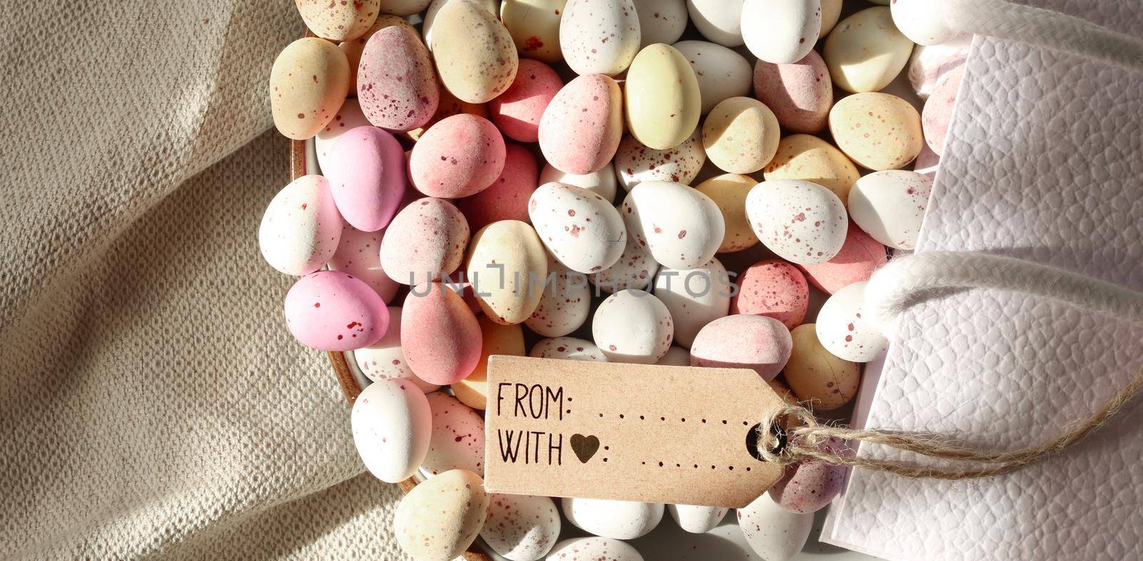 happy Easter background. Colourful Easter eggs, canvas, gift tag. Copy space. place for text