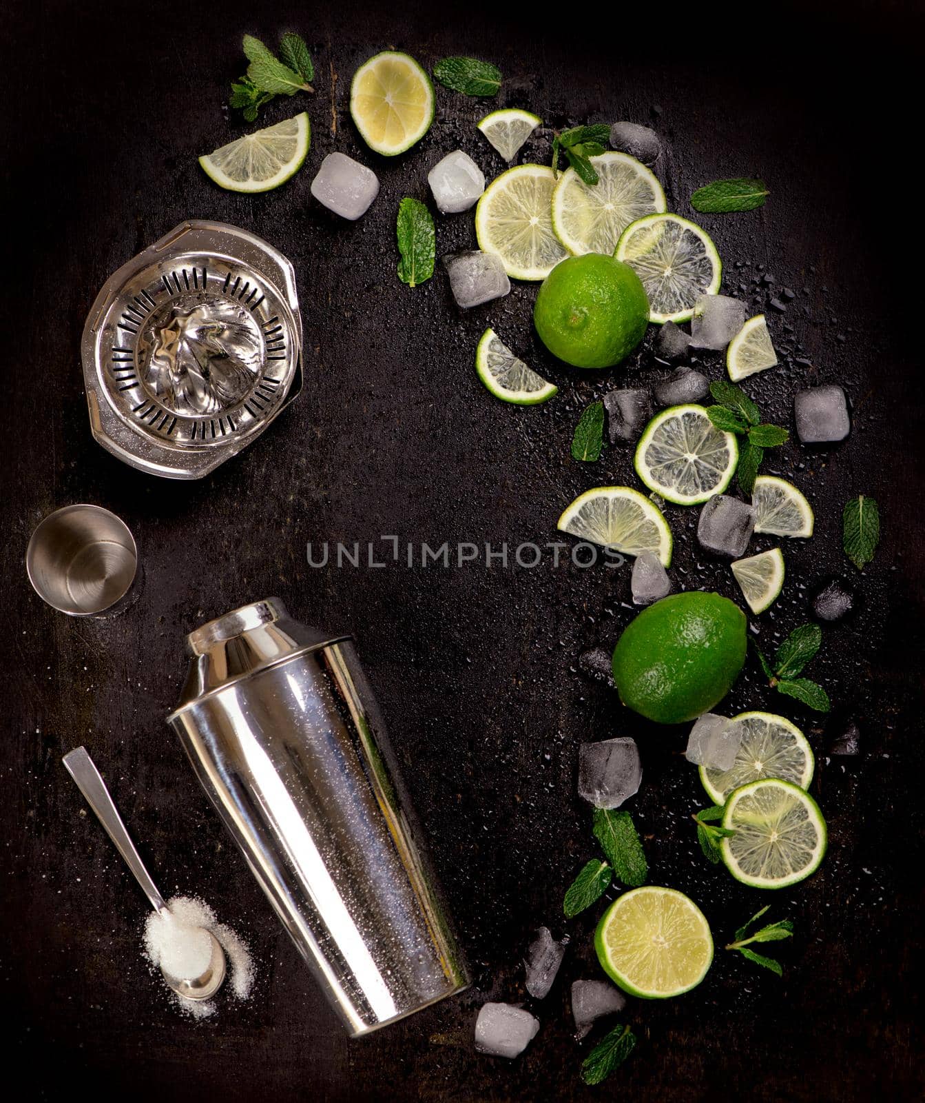 Bar accessories and ingredients for cocktail drink lime, mint, ice by aprilphoto