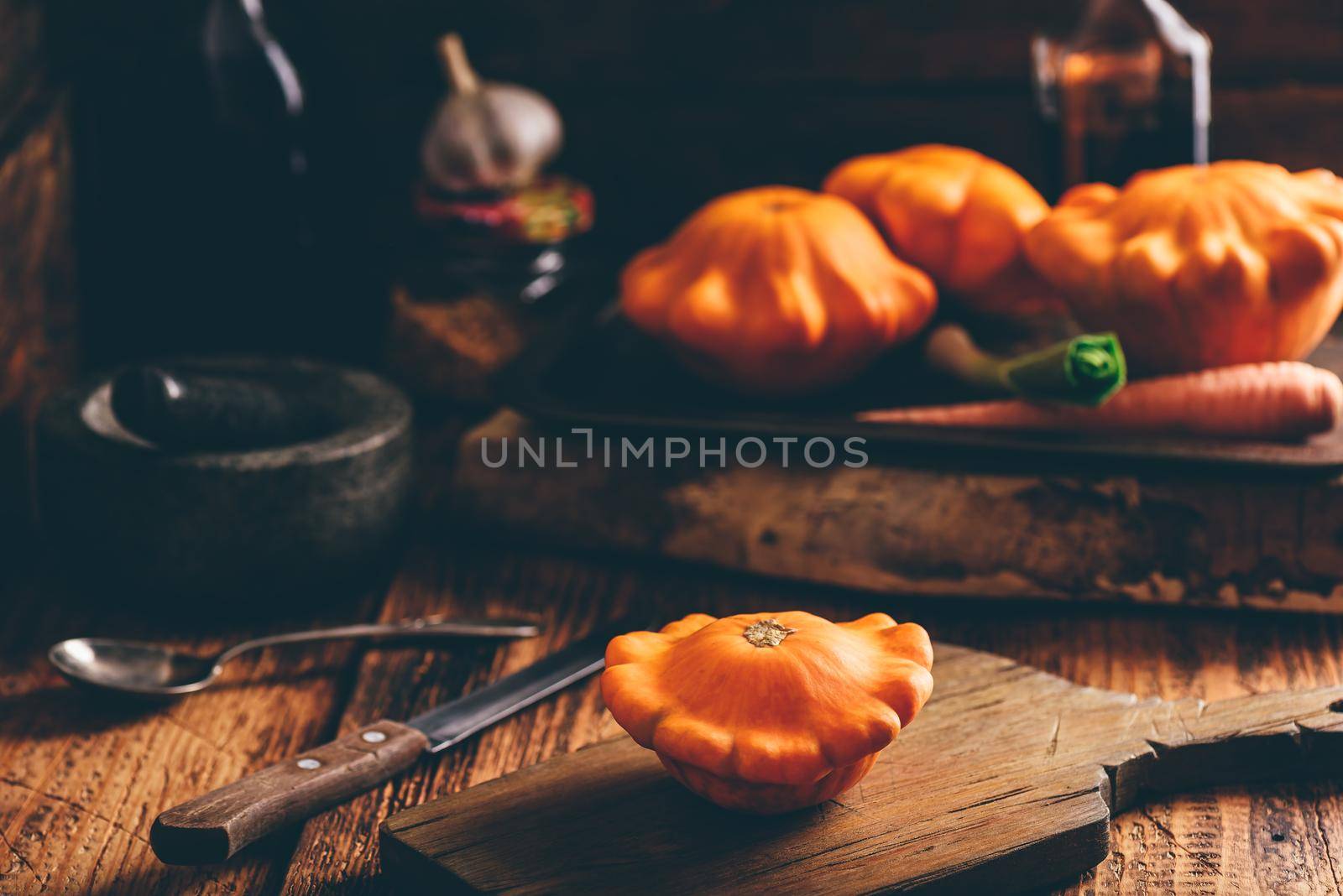 Pattypan squash on cutting board by Seva_blsv