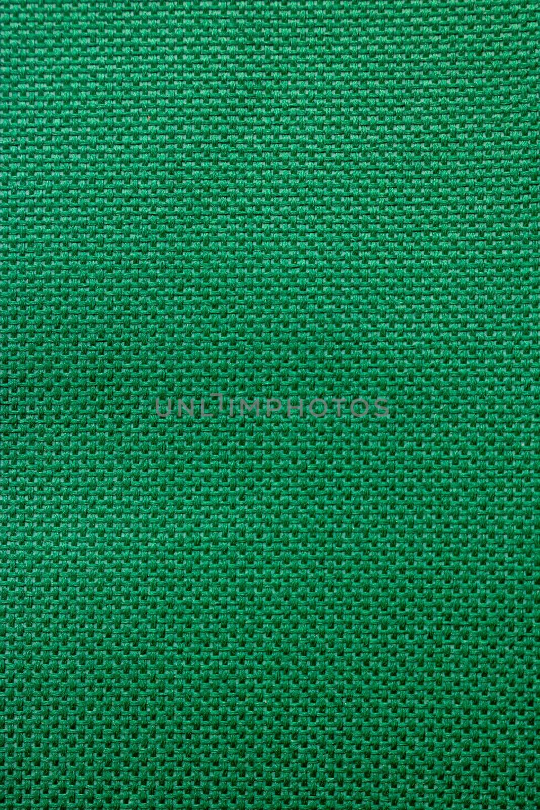 Dark green rough textile material. background texture close-up.