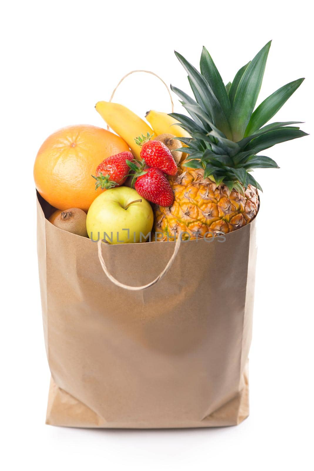 Fruits and vegetables in paper grocery bag isolated over white by aprilphoto