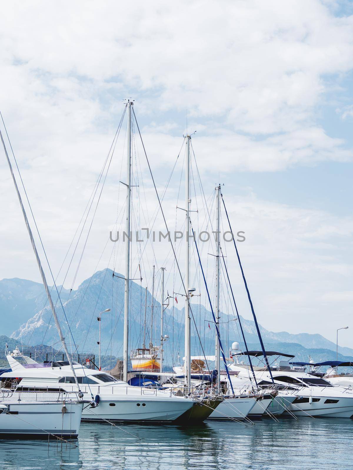 Yachts are moored at the Grand Marina, Kemer, Turkey. Beautiful ships for tourist trips on the Mediterranean sea. by aksenovko