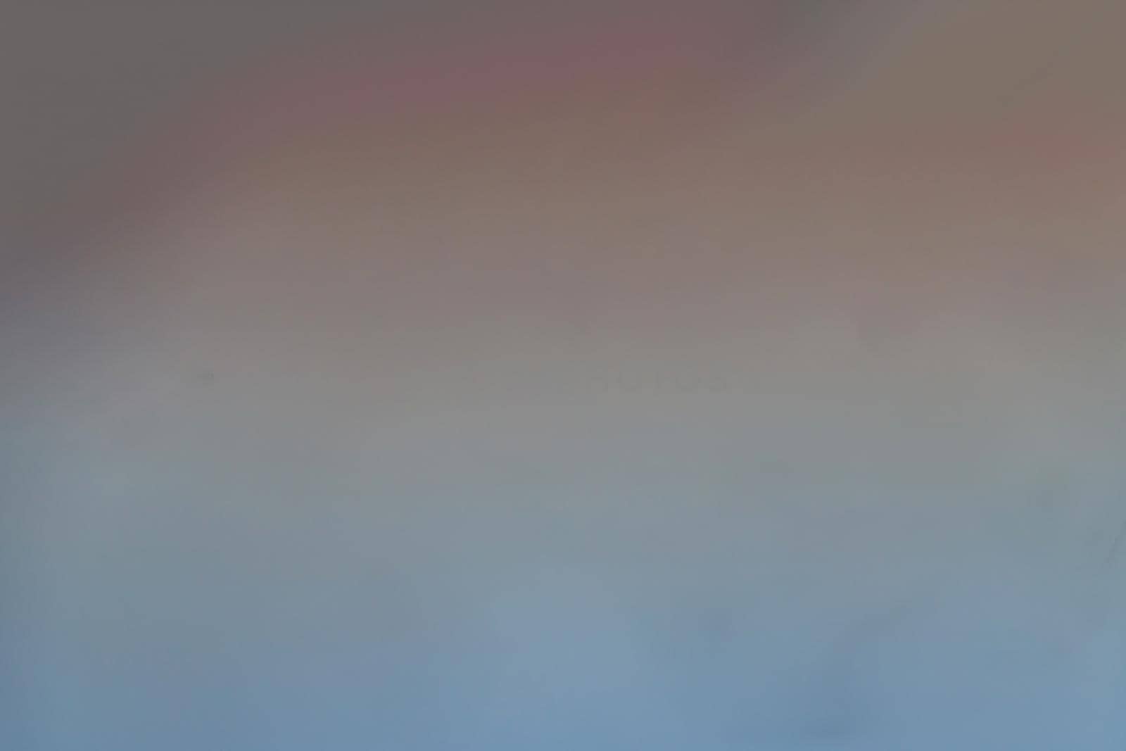 Background of blue and orange sky and empty space for your design. No cloud, No focus, specifically.