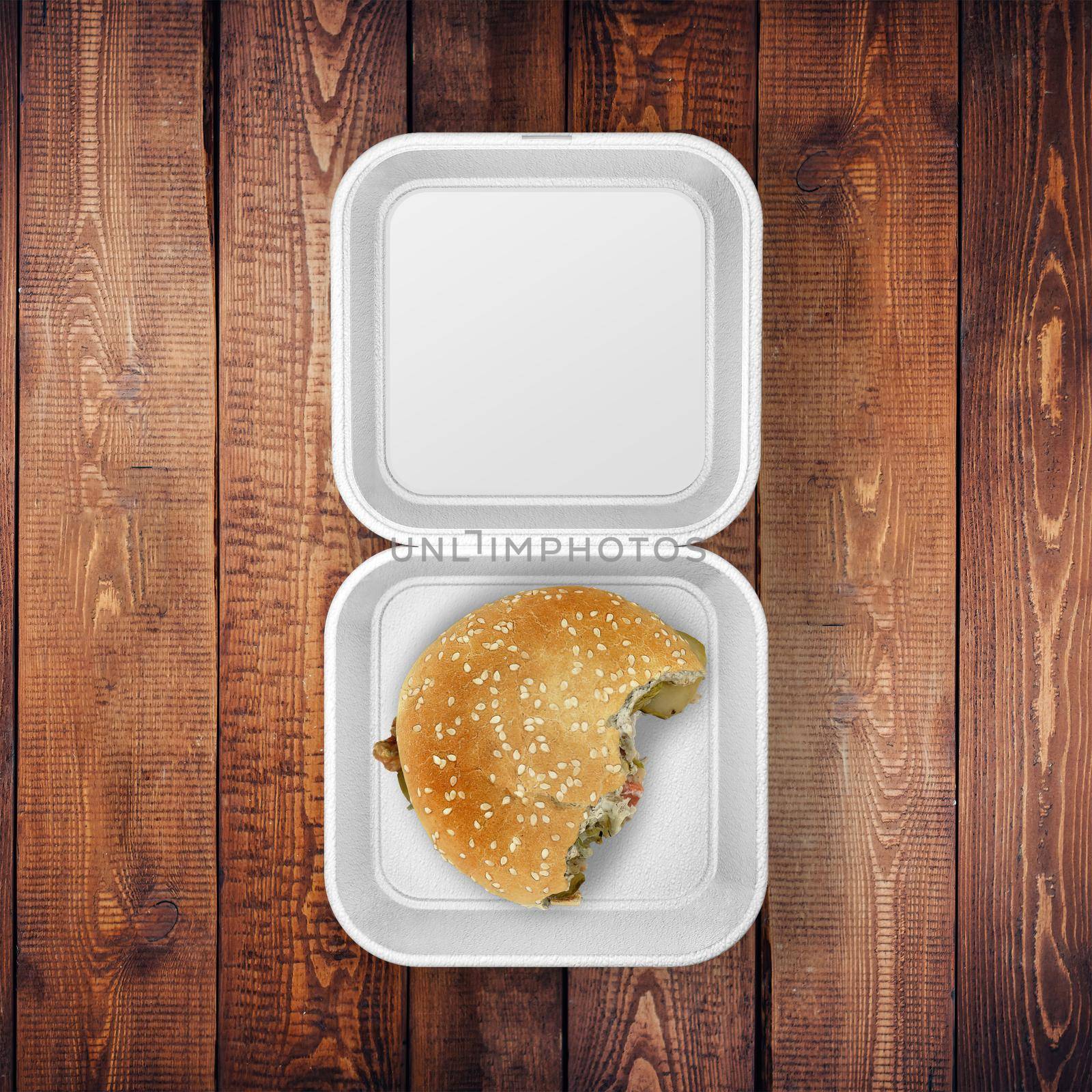 White Food Container Sticker With Burger Bite Mockup On The Wood Table