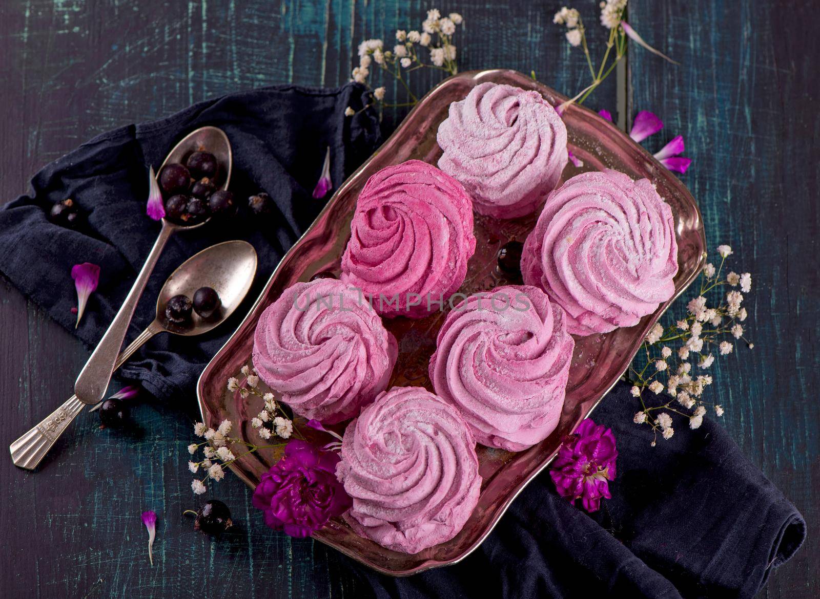 pink marshmallow on a wooden table. Top view by aprilphoto