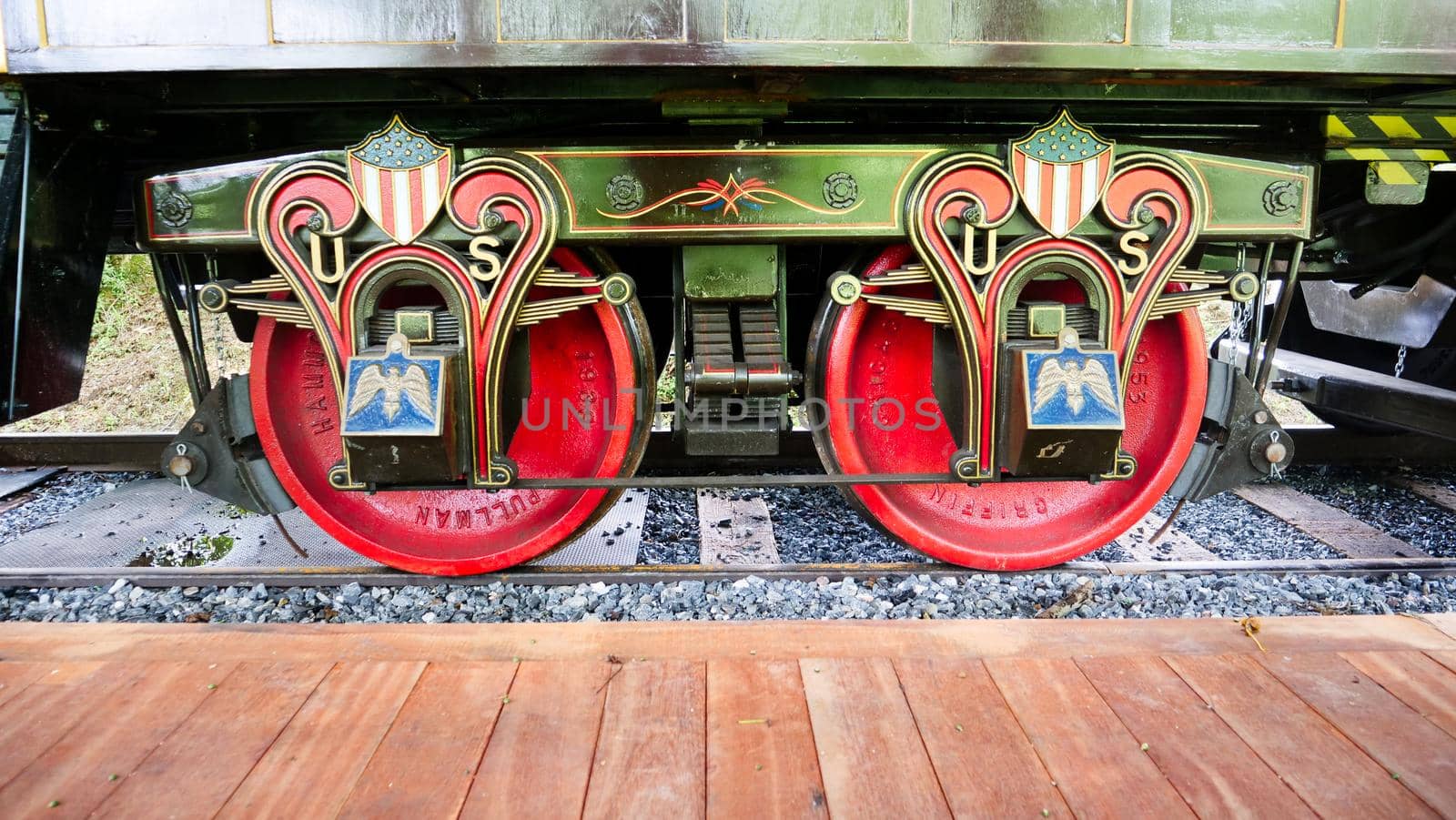 Antique Passenger Train Wheels in Red Blue and Gold