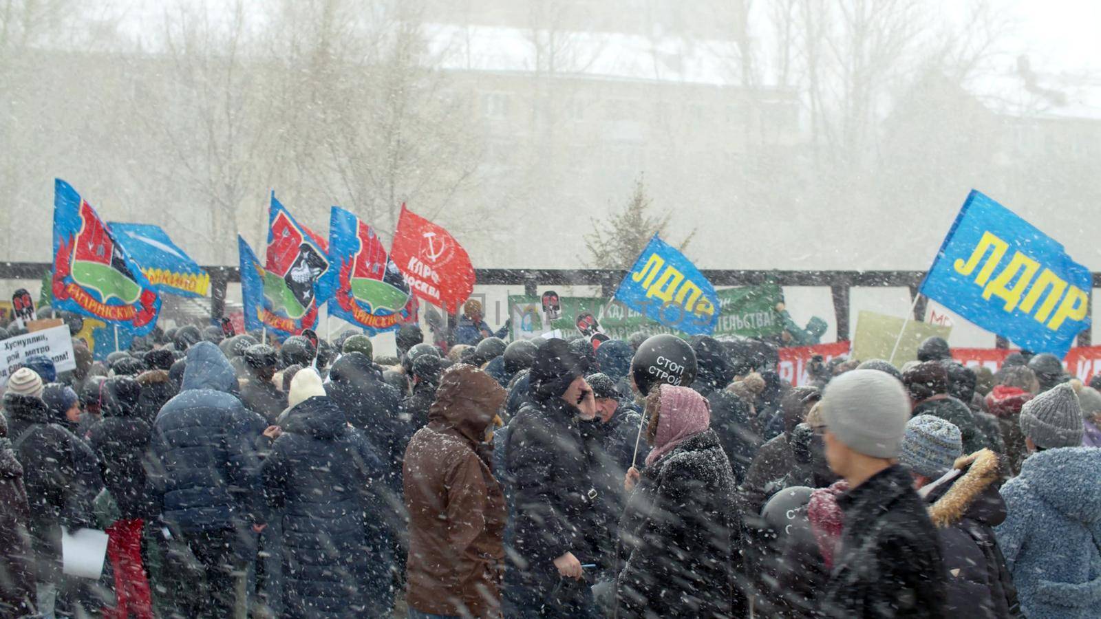 RUSSIA, MOSCOW, march 2020 - Crowd in Moscow under the snow at a protest rally against construction, for maintaining parks. Make Your Voice Heard series.
