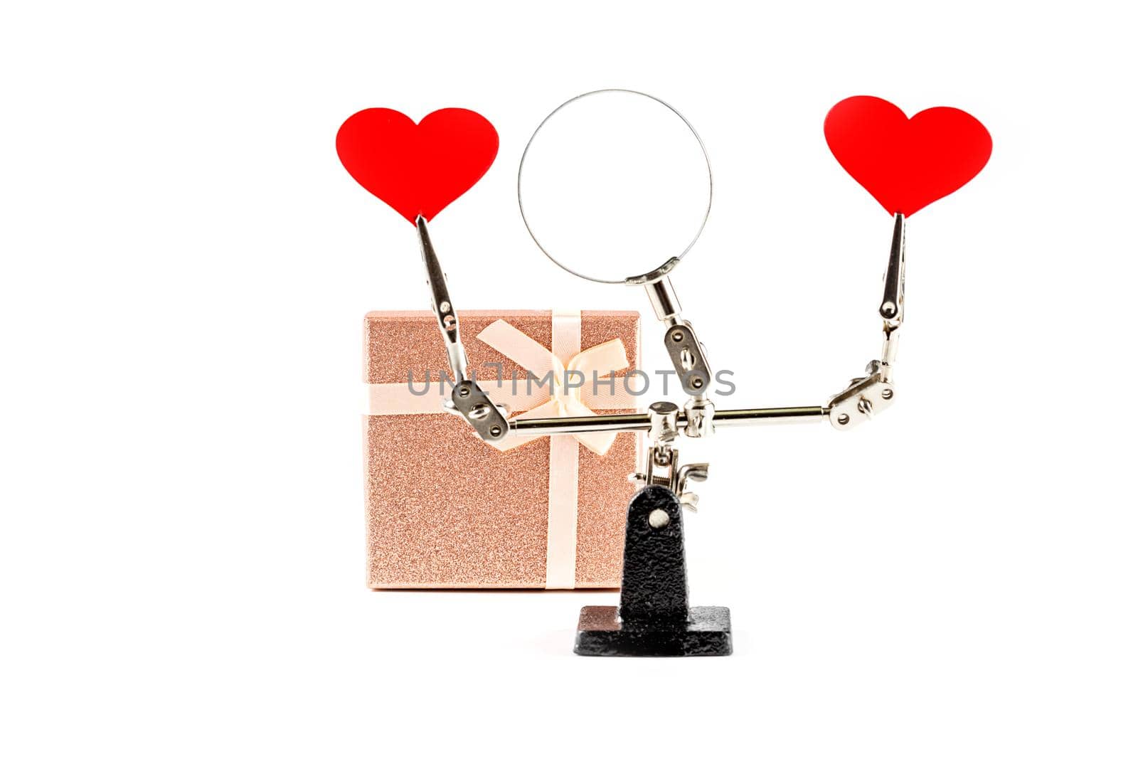 Valentines Day background with tool third hand holding hearts and gift by galinasharapova