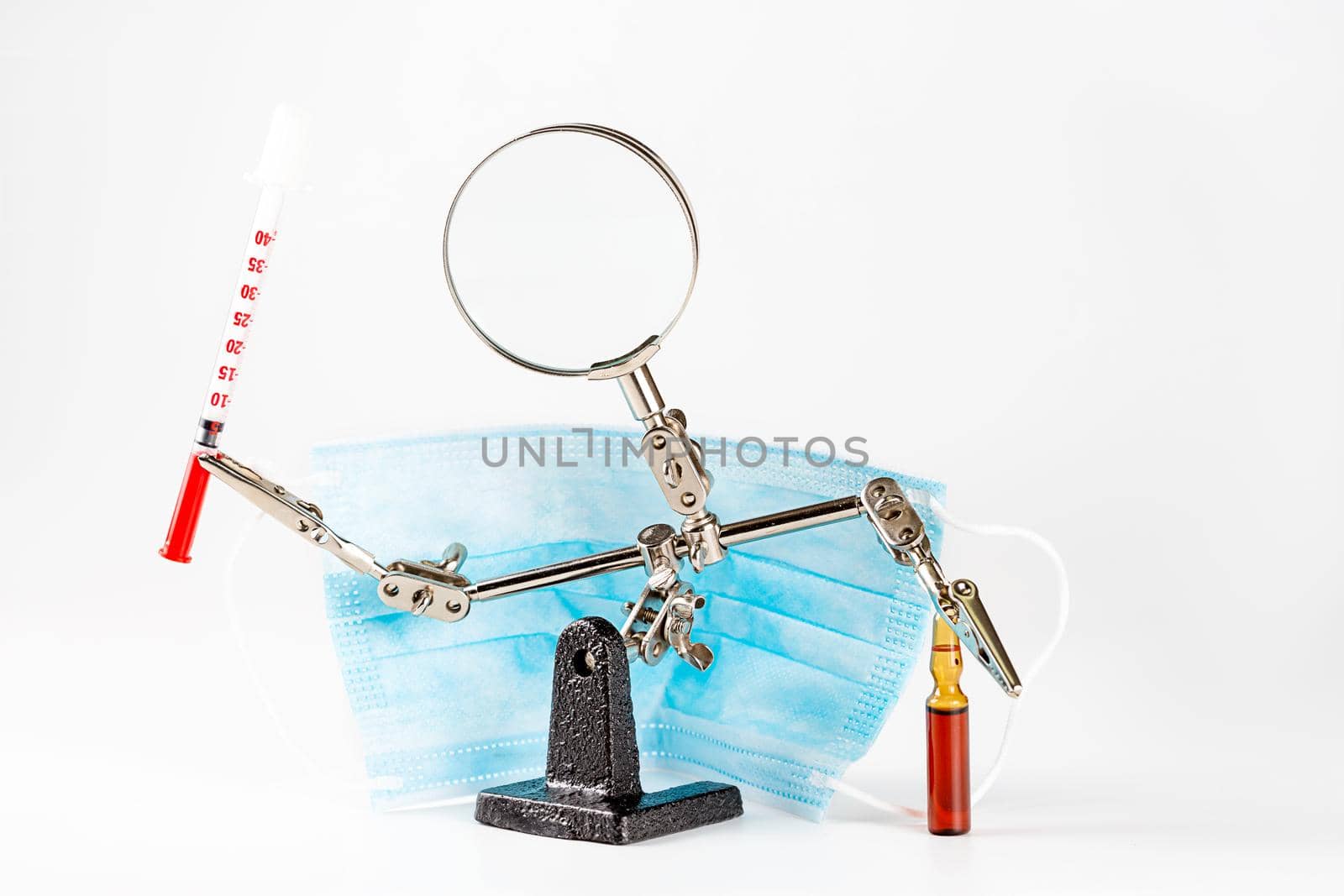 Abstract background with third hand holding ampoule and syringe isolate by galinasharapova