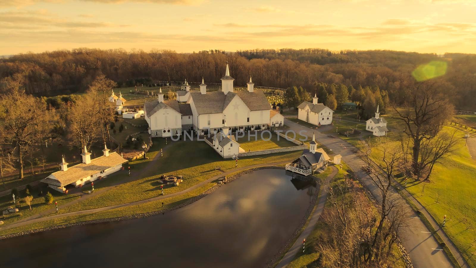 Late Afternoon Fall Aerial View of Beautiful Restored Barns and Countryside