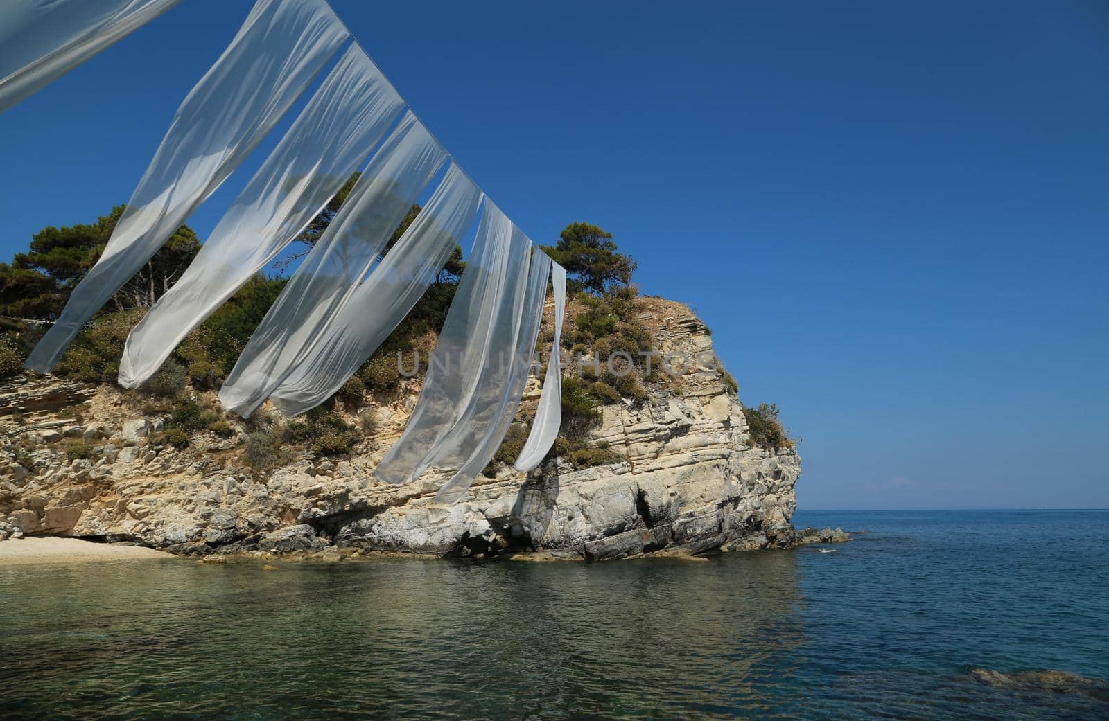 Summer beach, sea, white sail. Summer vacation travel holiday background concept. Greece Zakynthos