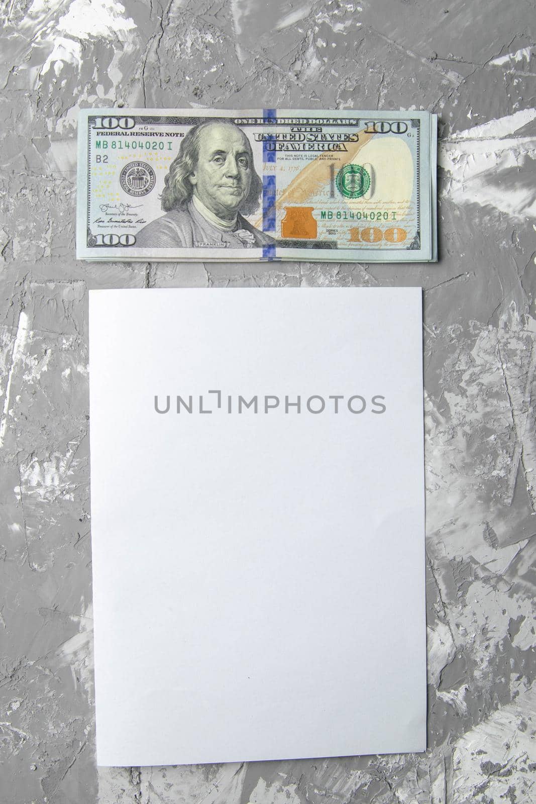 White blank sheets and american dollars, concept of planning and conservation, cash investment, clear space.