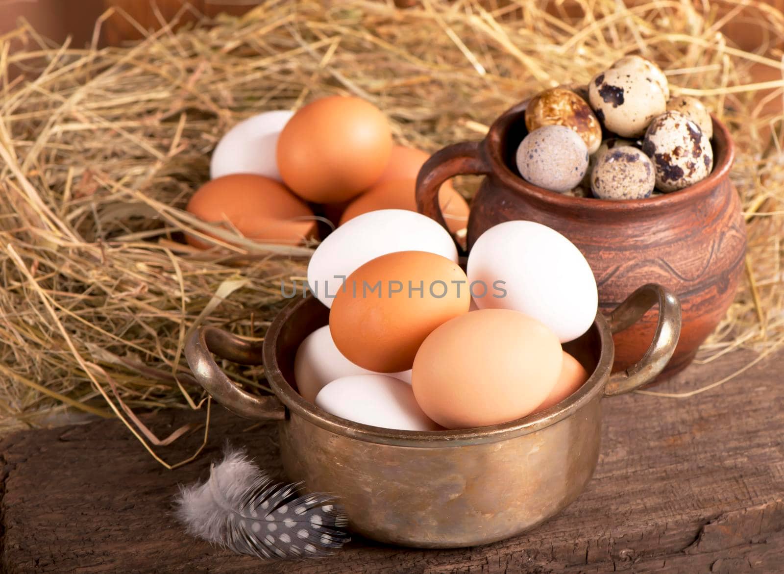 eggs on old wooden background by aprilphoto