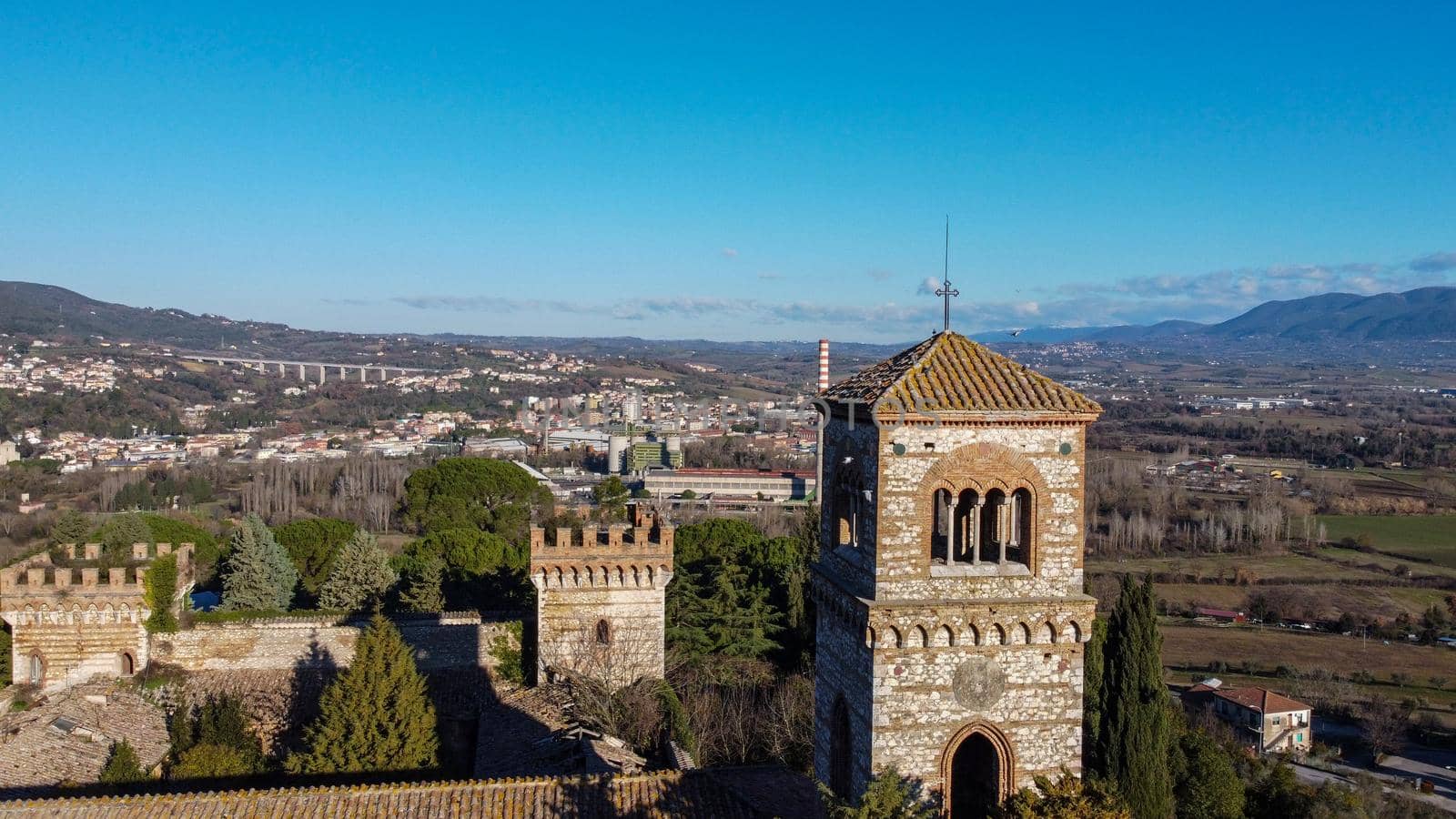 aerial photograph of the tower of the castle of San Girolamo in Narni in the background city of Terni