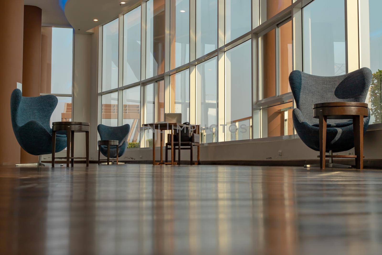 Bangkok, Thailand - Jan 14, 2021 : The new normal for common area in condominium. The seats were set separately according to social distancing policy for the spread of covid-19 prevention. No focus, specifically.