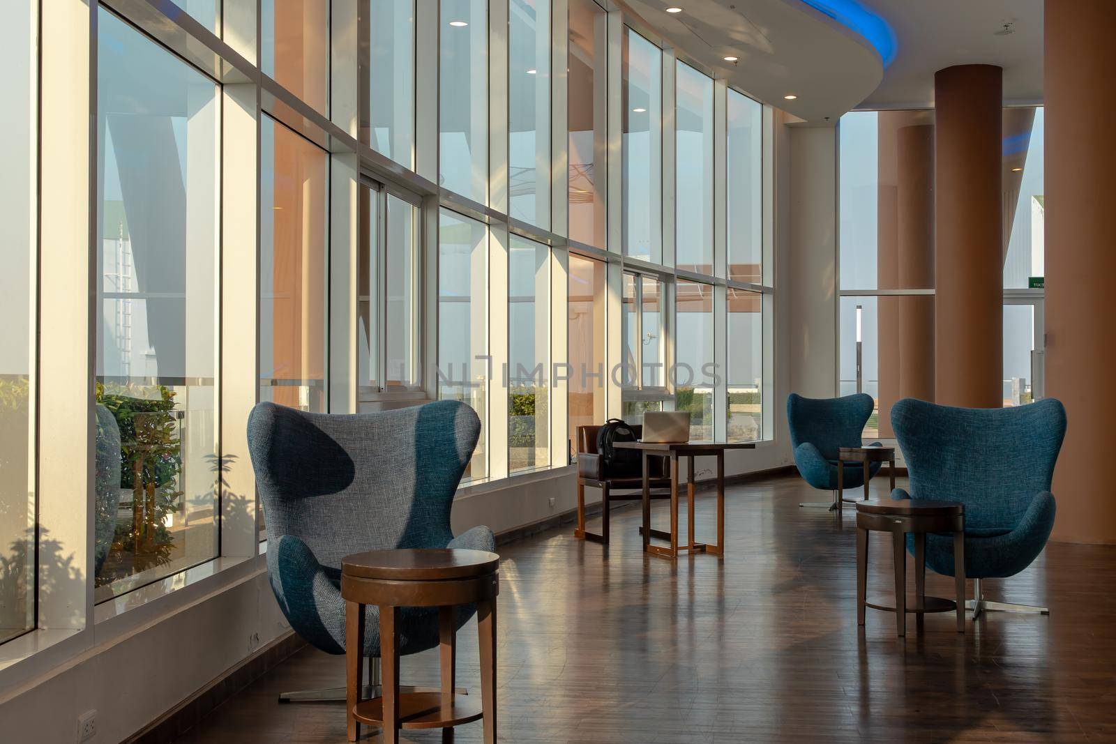 Bangkok, Thailand - Jan 14, 2021 : The new normal for common area in condominium. The seats were set separately according to social distancing policy for the spread of covid-19 prevention. No focus, specifically.