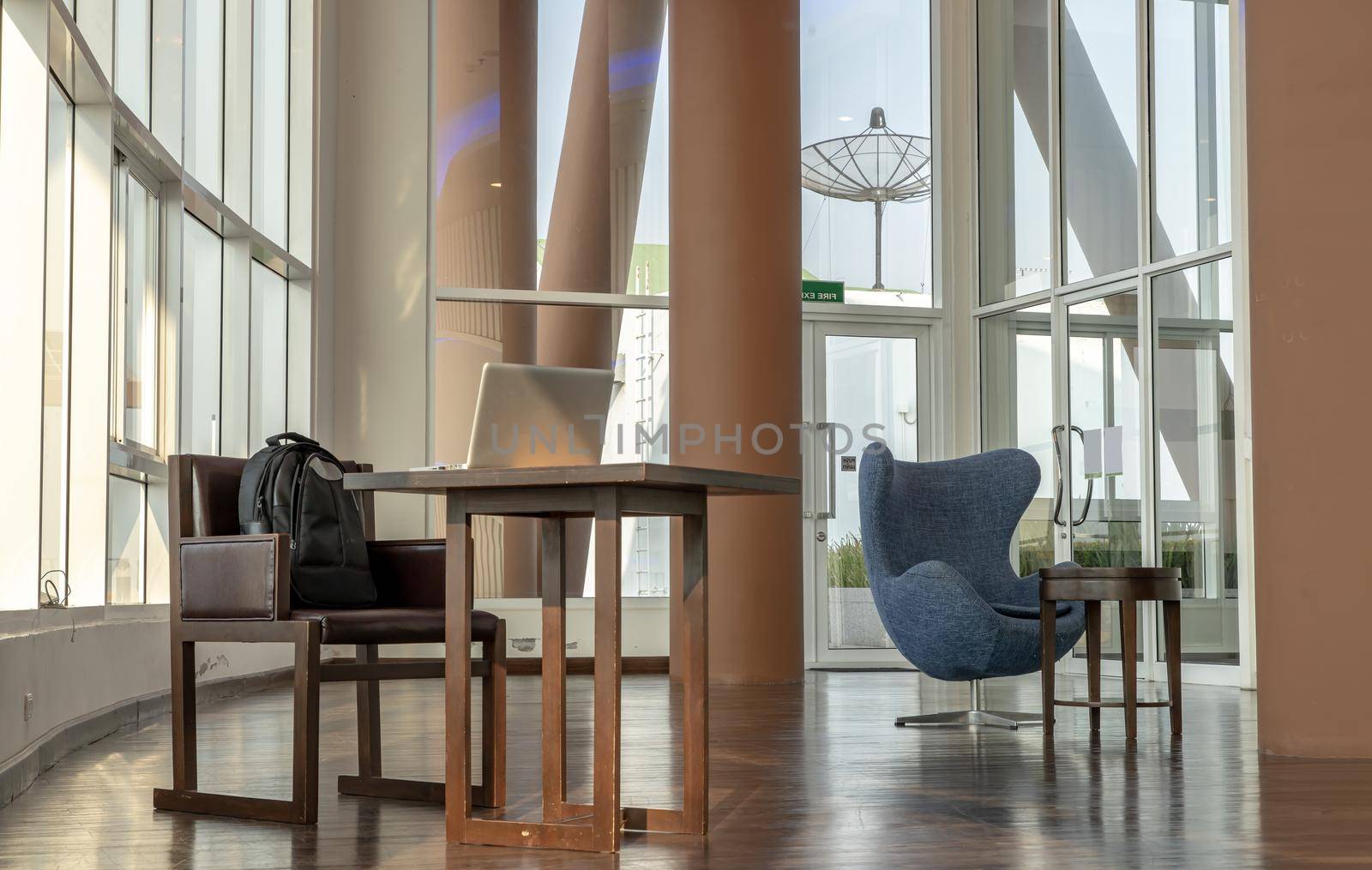 Bangkok, Thailand - Jan 14, 2021 : The new normal for common area in condominium. The seats were set separately according to social distancing policy for the spread of covid-19 prevention. No focus, specifically.