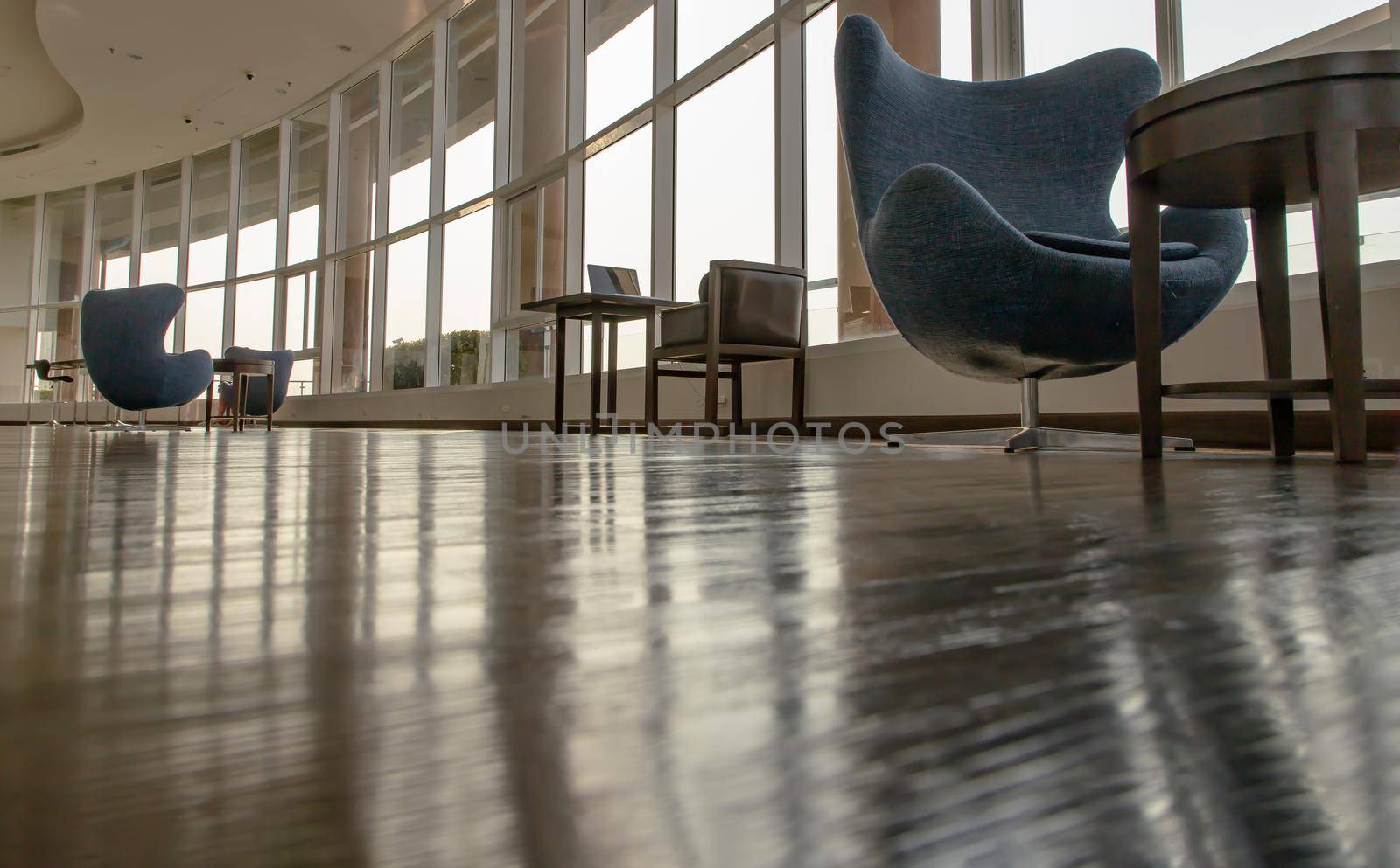 Bangkok, Thailand - Jan 14, 2021 : The new normal for common area in condominium. The seats were set separately according to social distancing policy for the spread of covid-19 prevention. No focus, specifically.