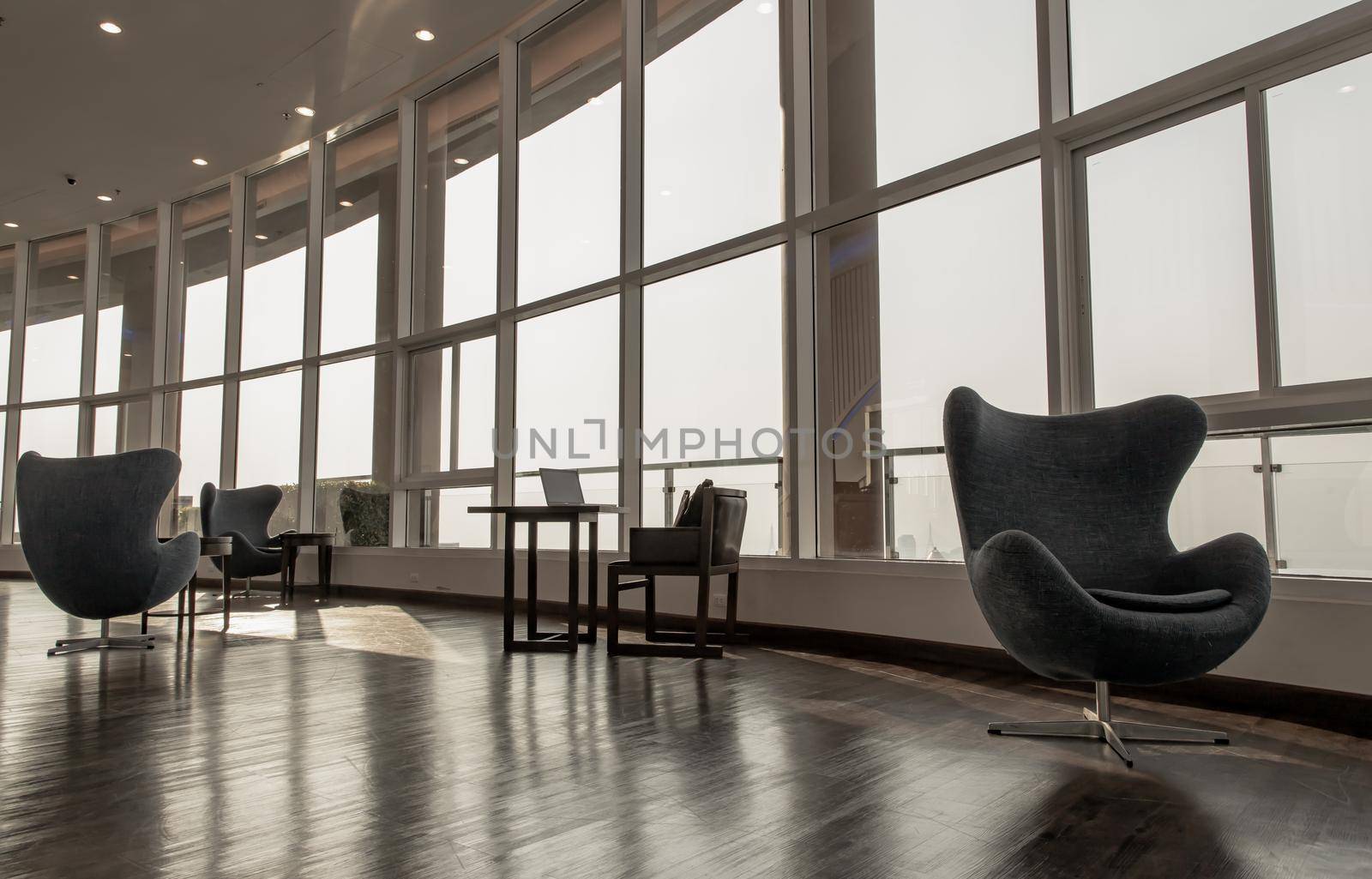 Bangkok, Thailand - Jan 14, 2021 : The new normal for common area in condominium. The seats were set separately according to social distancing policy for the spread of covid-19 prevention. No focus, specifically.