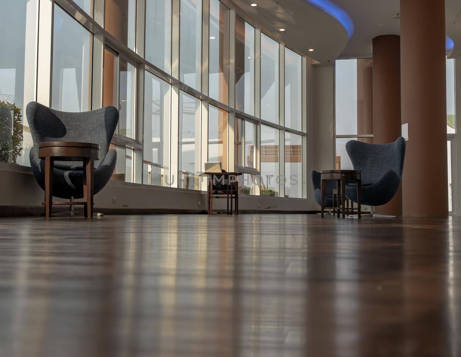 Bangkok, Thailand - Jan 14, 2021 : The new normal for common area in condominium. The seats were set separately according to social distancing policy for the spread of covid-19 prevention. No focus, specifically.