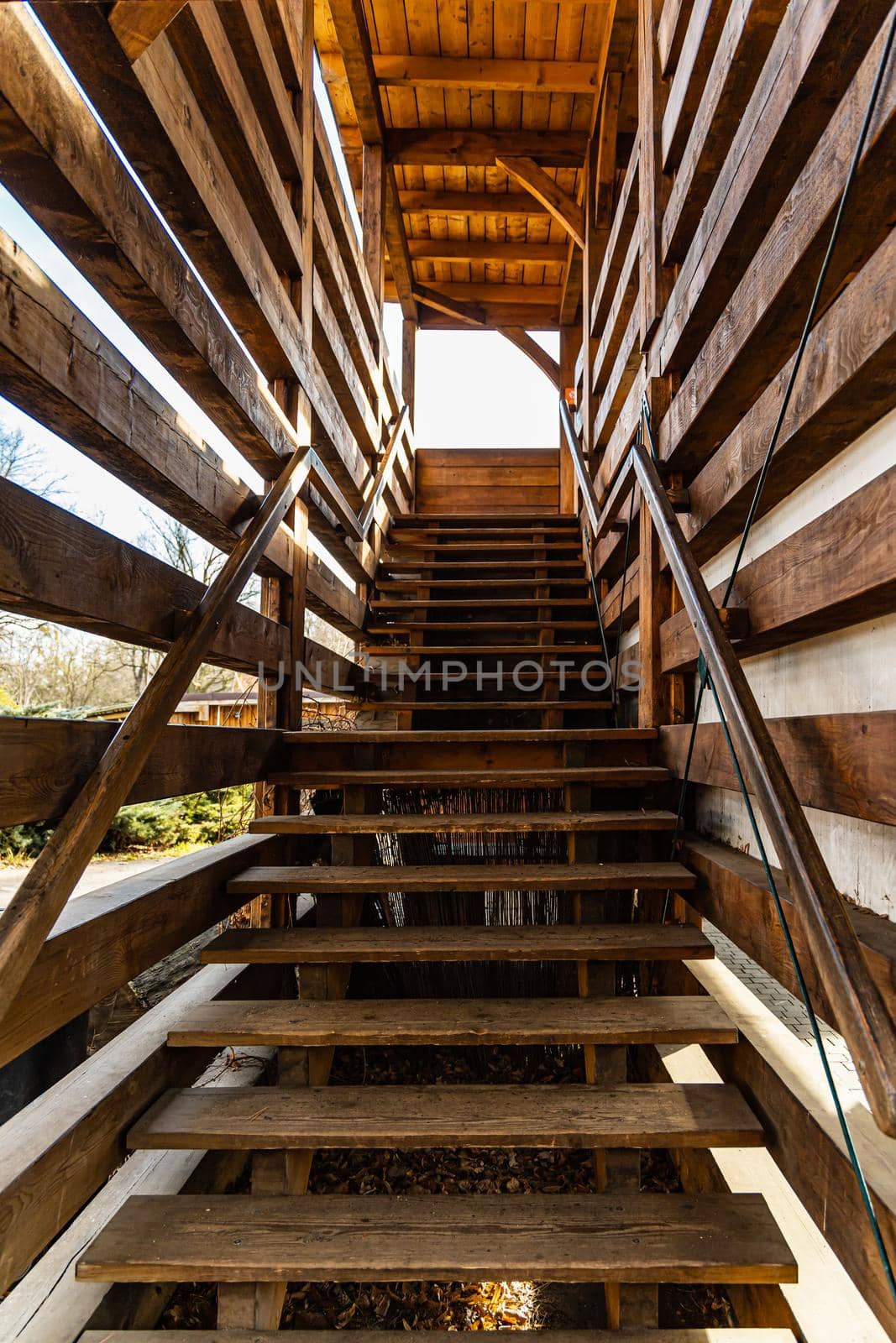 Wooden stairs to small wooden viewing platform by Wierzchu