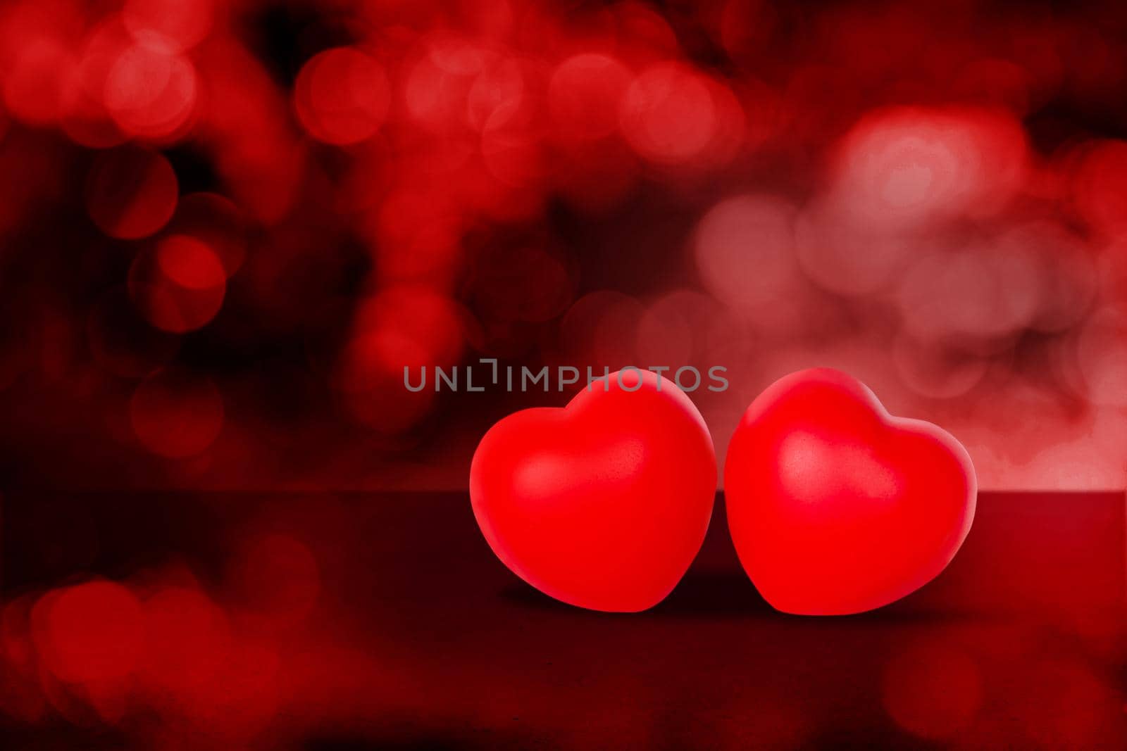 Two Heart shape on red bokeh background, abstract with glitter glowing, February 14 Valentine day, symbol of love and anniversary with romantic, couple sign with romance, nobody, holiday concept. by nnudoo