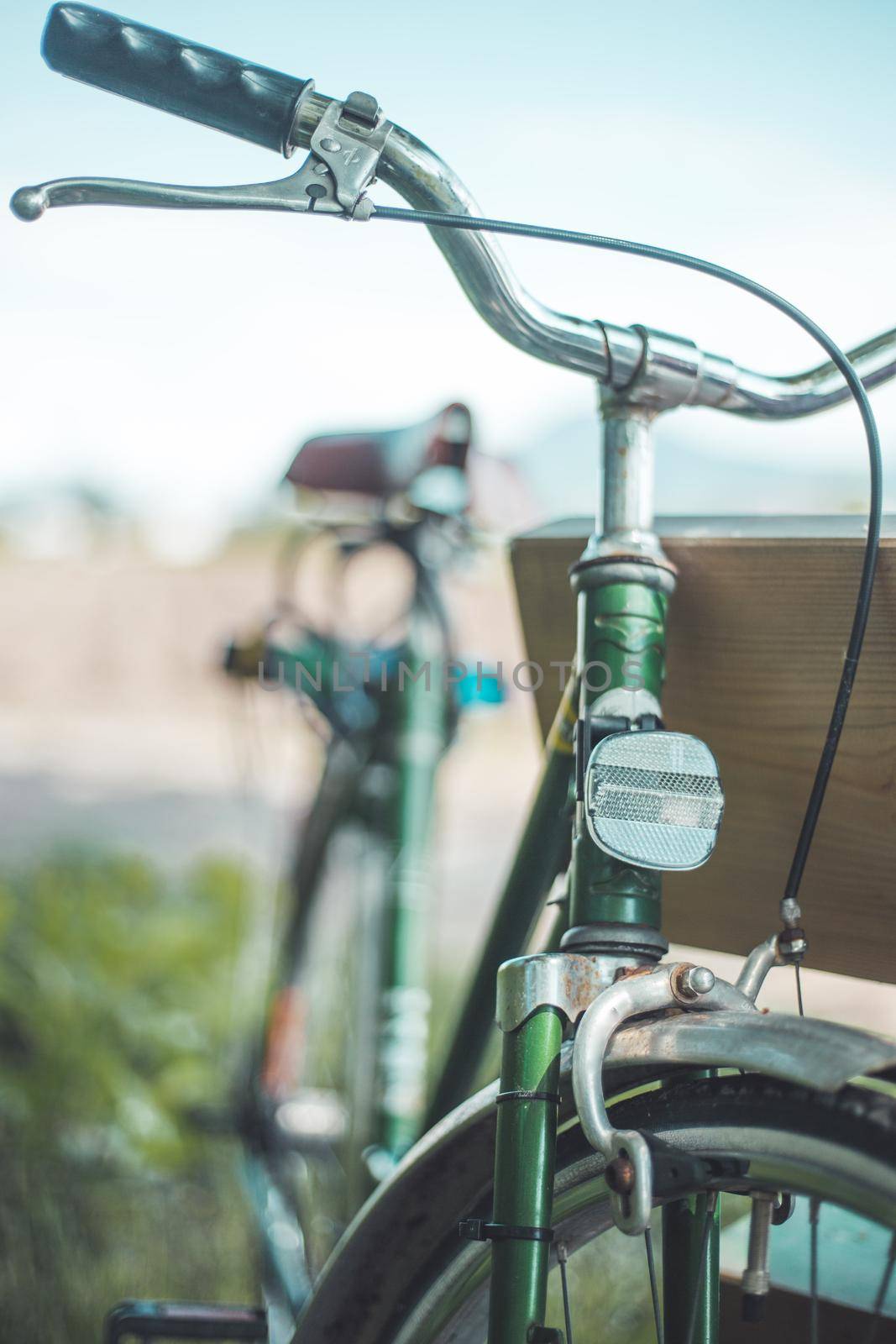 Retro bike adventure: Front picture of vintage bike, blurred background by Daxenbichler