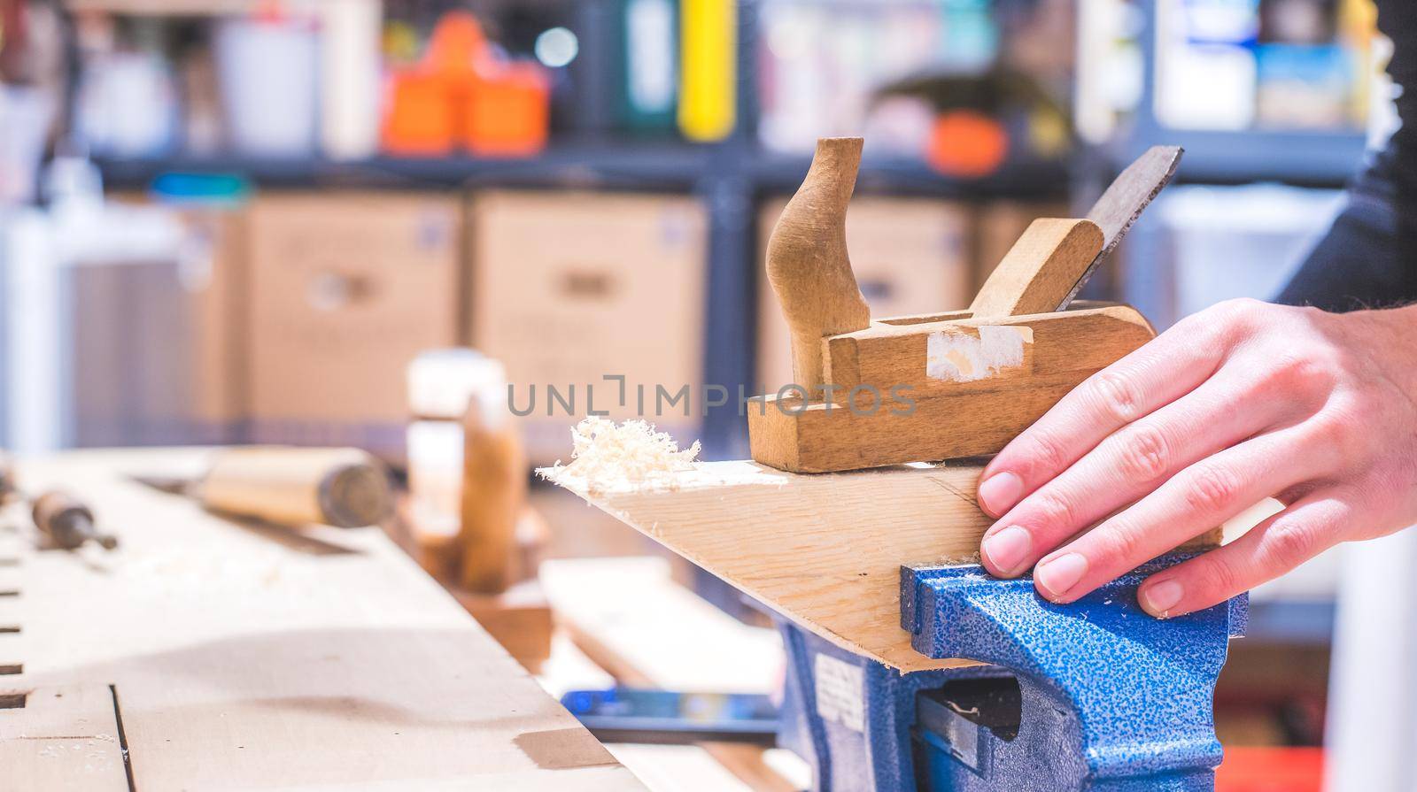 Close up of plane for smoothing timber, workshop