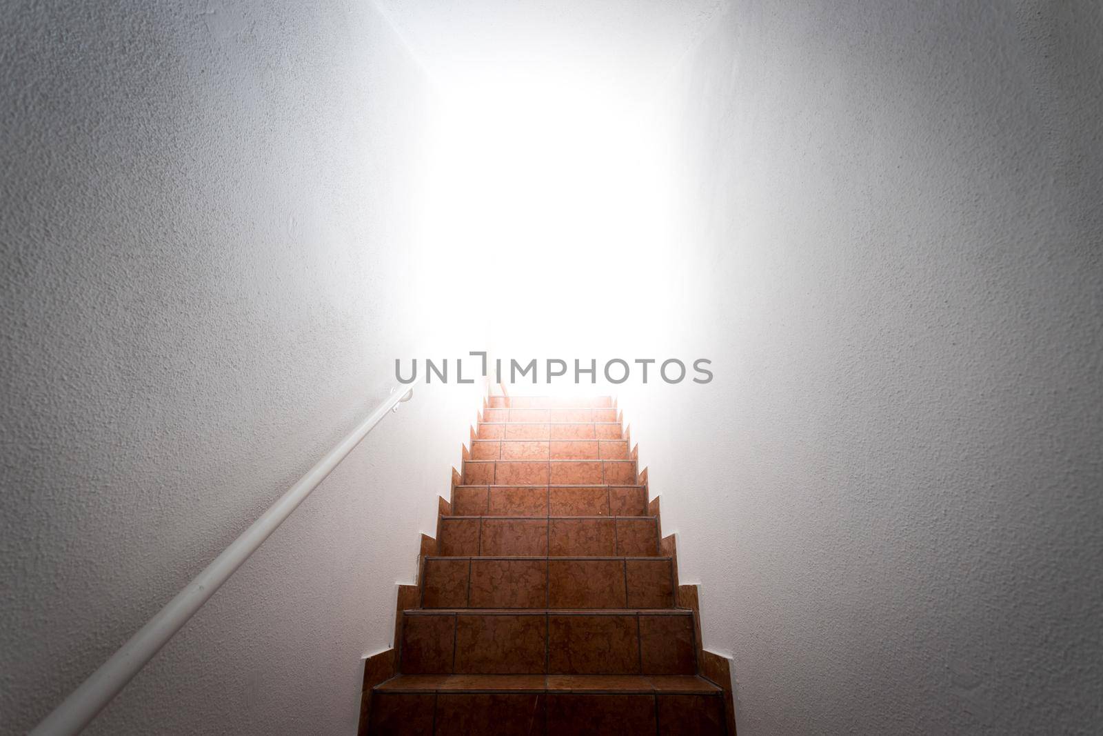 Basement stairs with balustrade. Natural bright sunlight.