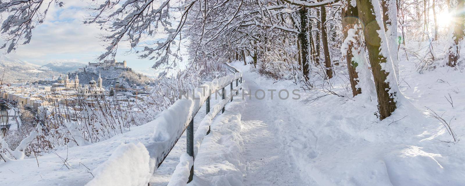 Walking promenade in Salzburg, snowy winter landscape by Daxenbichler