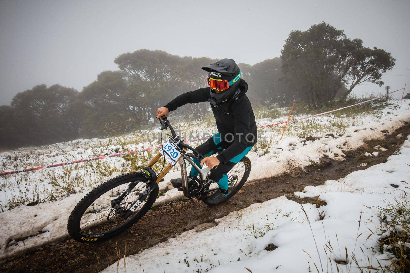 Mt Buller, Australia - January 16 2021: Practice round for the Victorian Downhill Mountain Bike Series after a summer snow storm