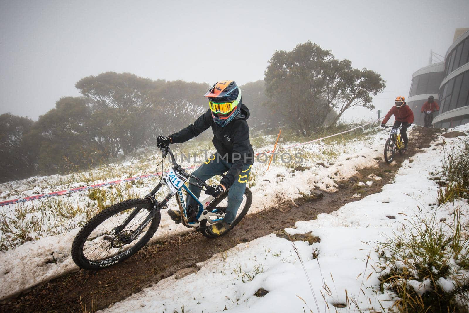 Mt Buller, Australia - January 16 2021: Practice round for the Victorian Downhill Mountain Bike Series after a summer snow storm