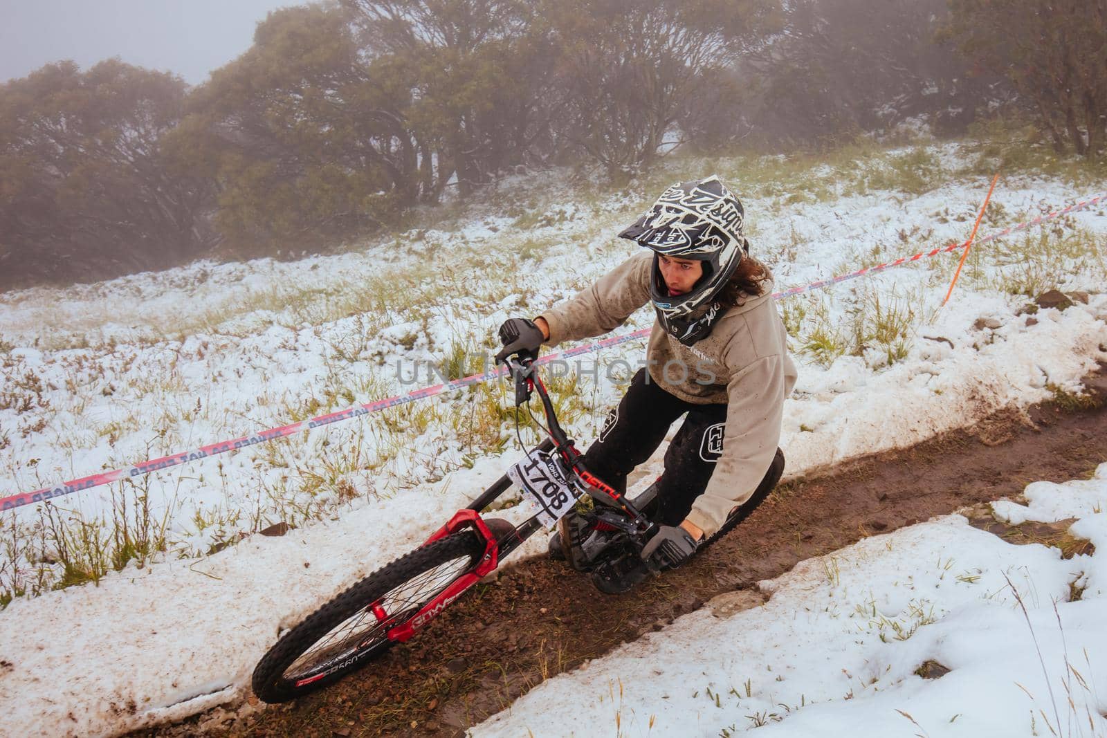 Mt Buller, Australia - January 16 2021: Practice round for the Victorian Downhill Mountain Bike Series after a summer snow storm