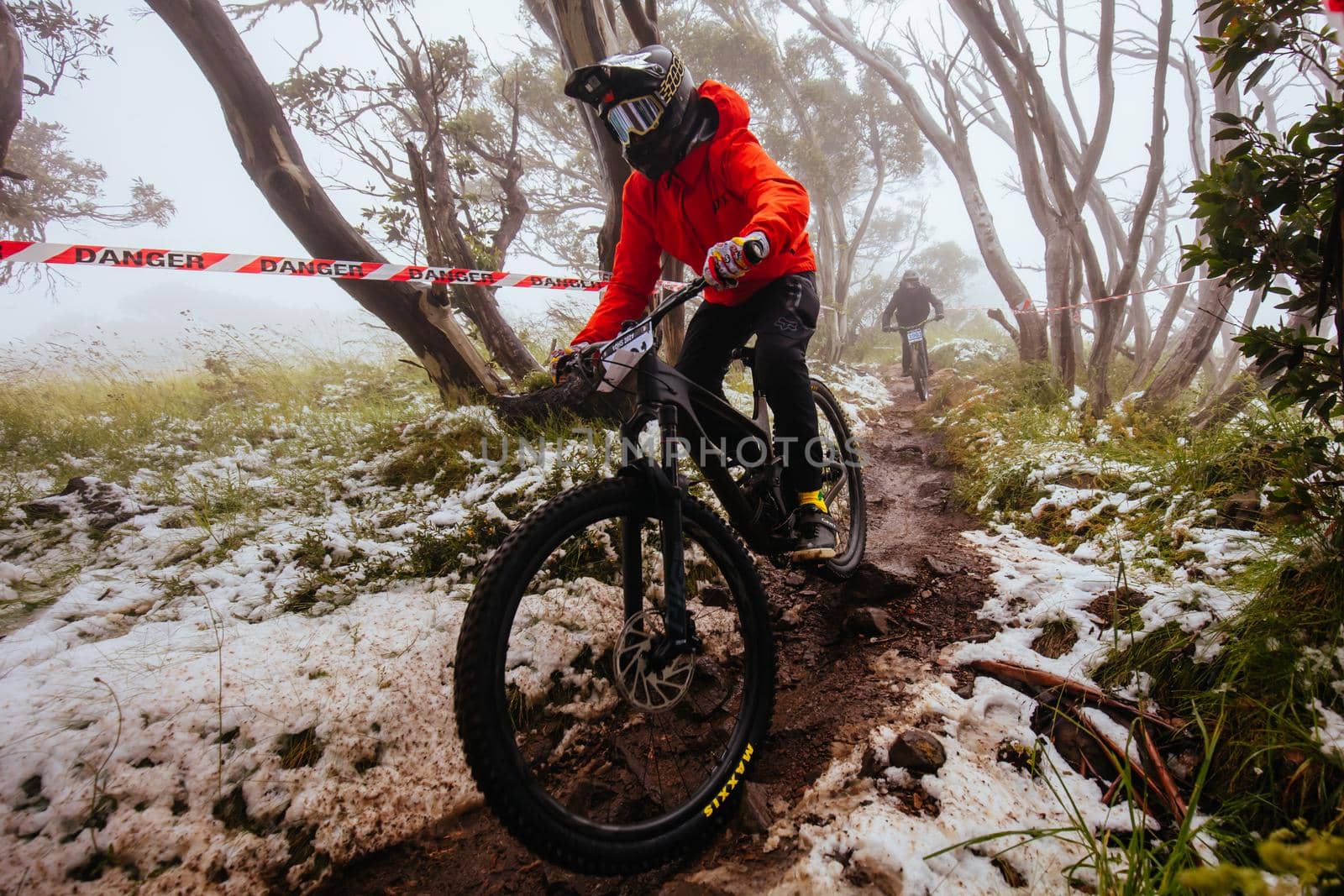 Mt Buller, Australia - January 16 2021: Practice round for the Victorian Downhill Mountain Bike Series after a summer snow storm