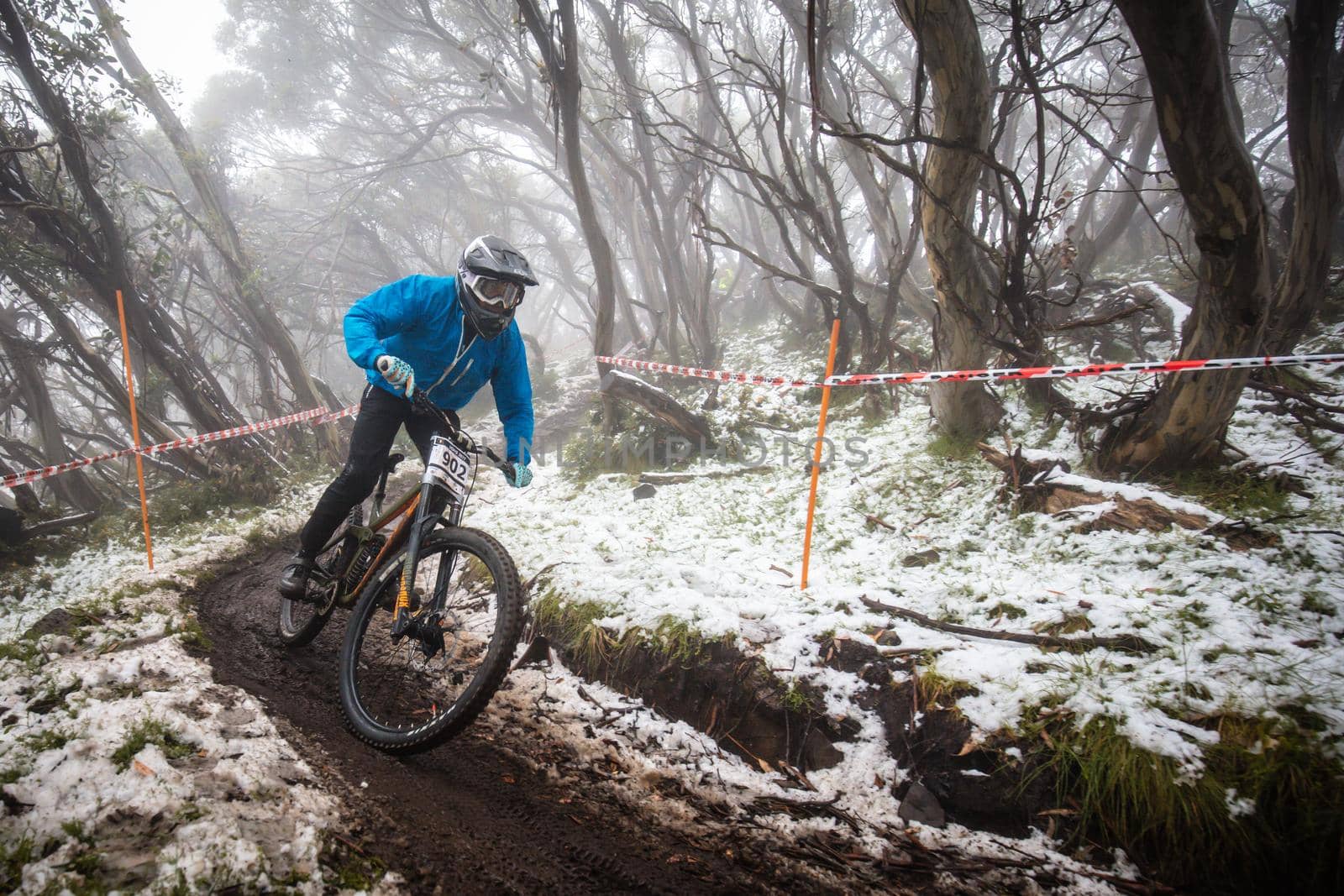 Mt Buller, Australia - January 16 2021: Practice round for the Victorian Downhill Mountain Bike Series after a summer snow storm