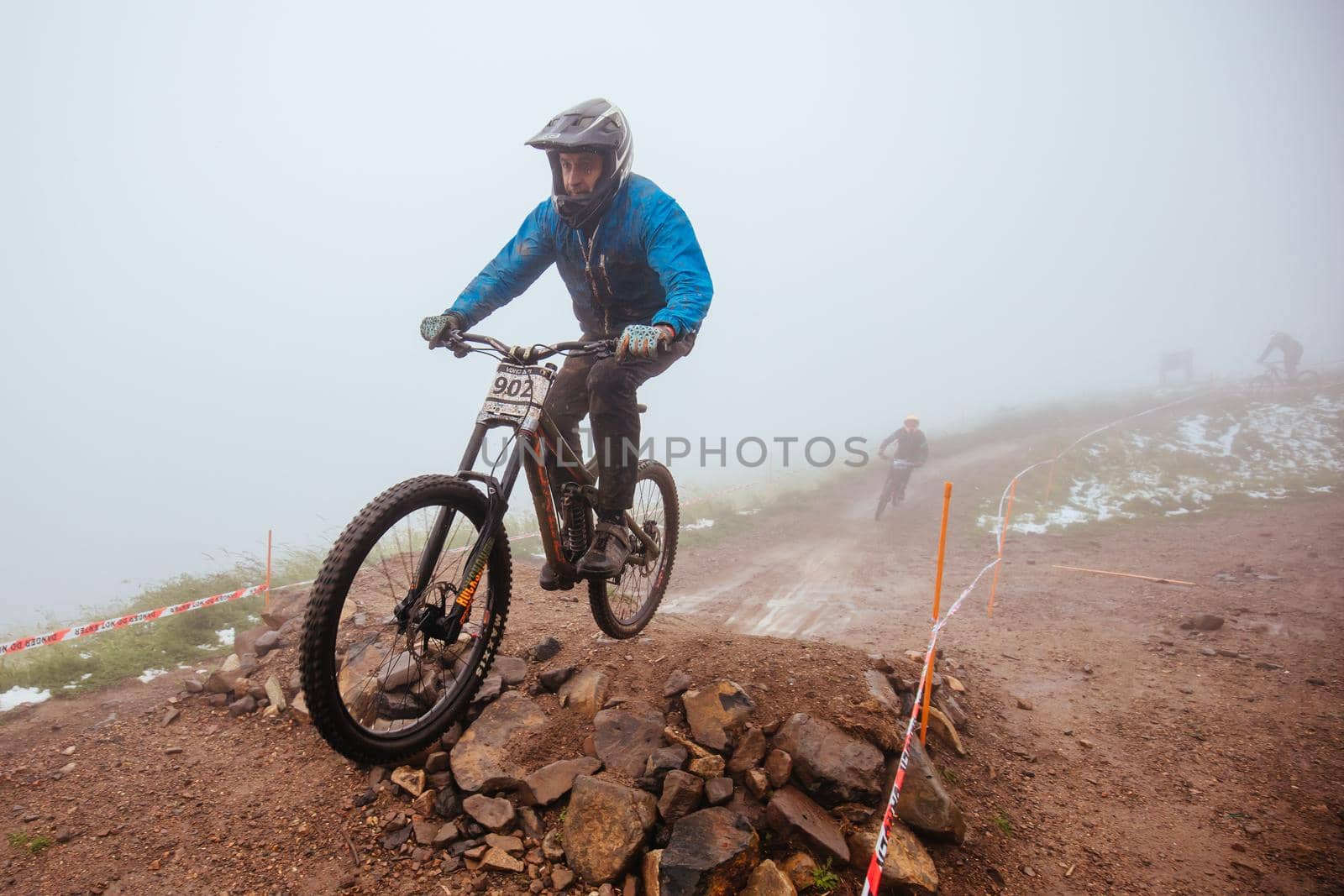 Mt Buller, Australia - January 16 2021: Practice round for the Victorian Downhill Mountain Bike Series after a summer snow storm