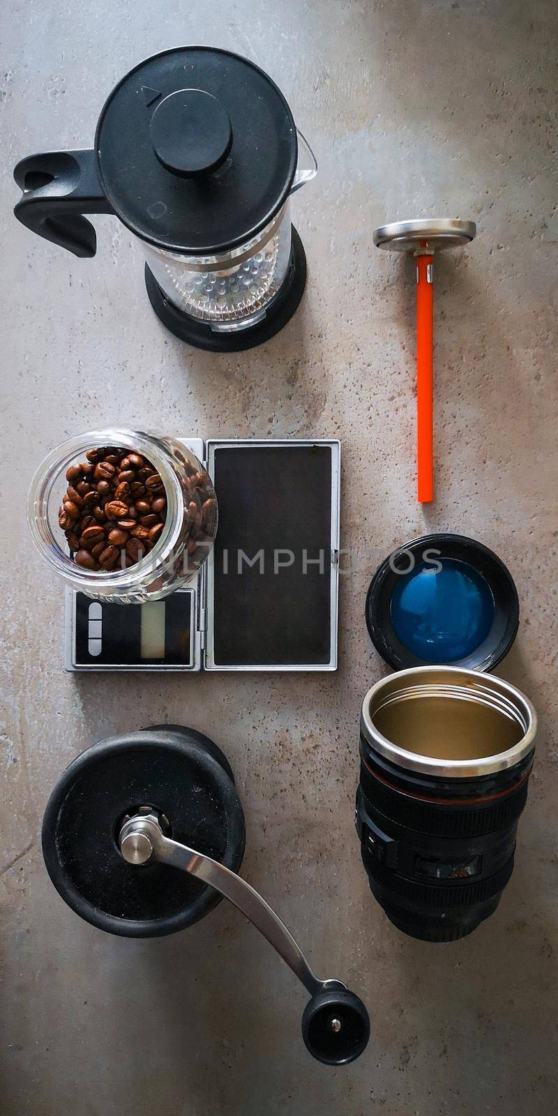 Coffee equipment like frenchpress coffee cup thermometer hand grinder electronic scale and coffee beans