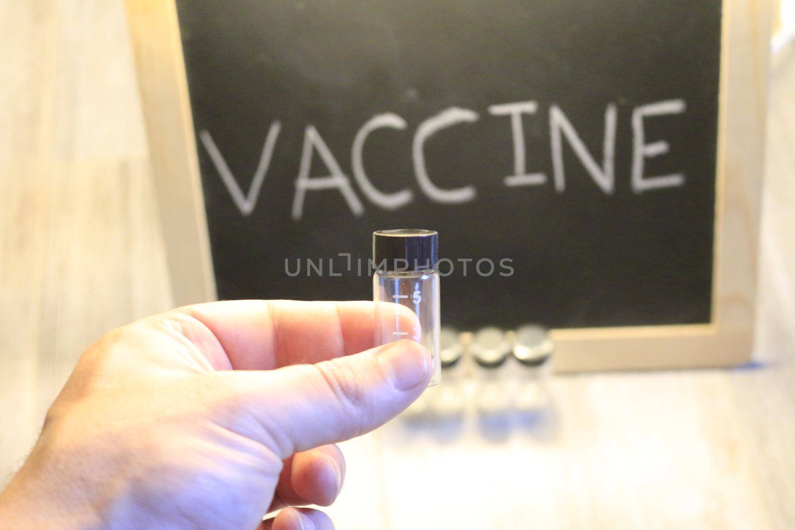 chalkboard with the word vaccine on it. good for any vaccine themed images. High quality photo