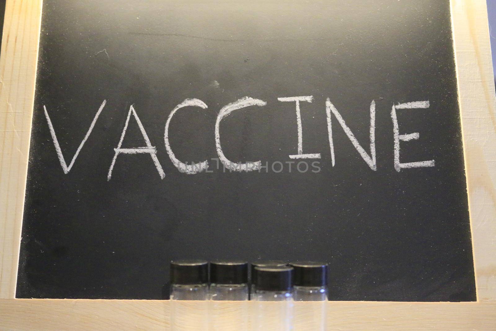 chalkboard with the word vaccine on it. good for any vaccine themed images. High quality photo