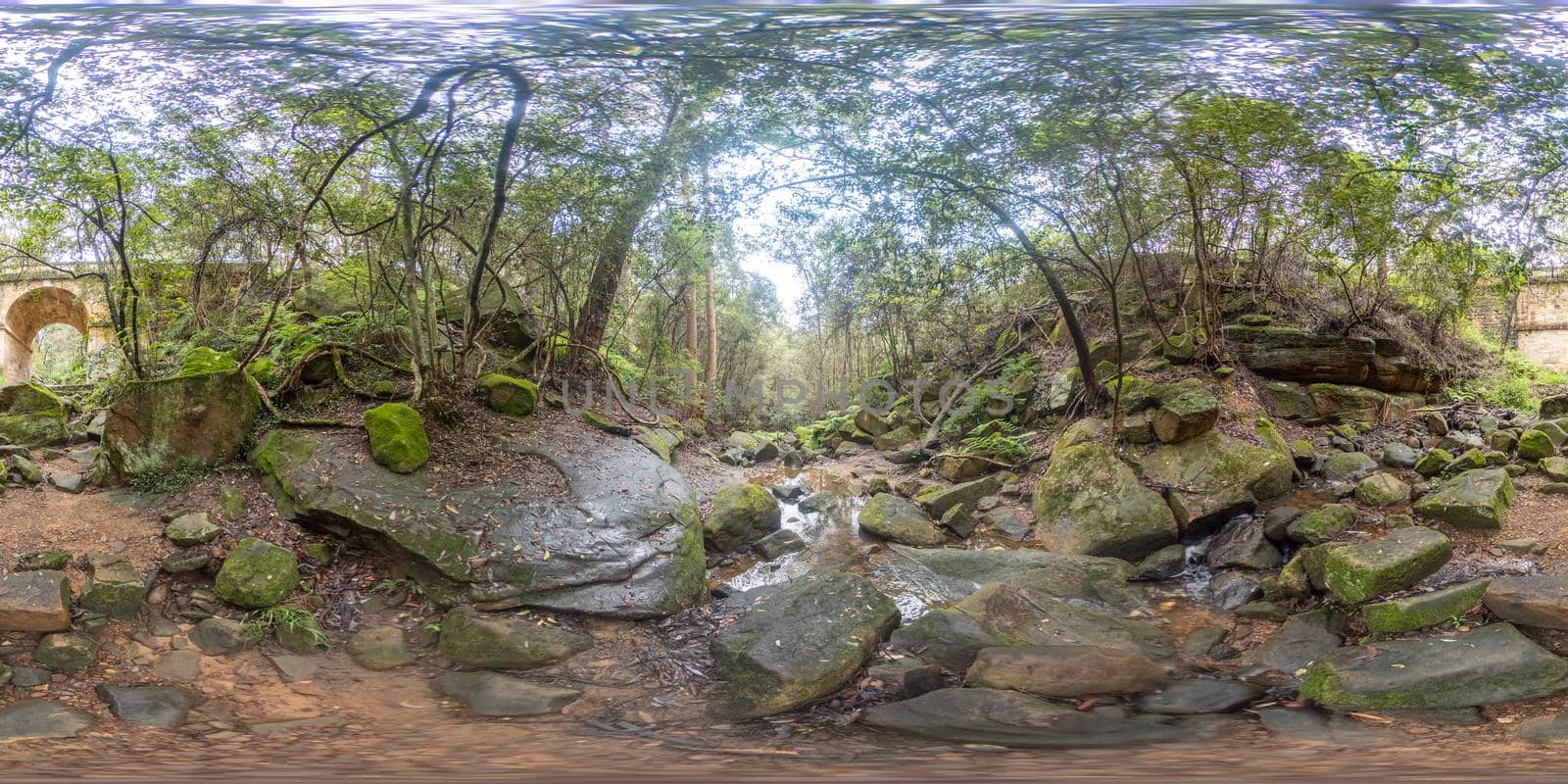 Spherical 360 panoramic photograph of Lapstone Creek and the World Heritage listed Lennox Bridge in Glenbrook in The Blue Mountains in regional New South Wales in Australia