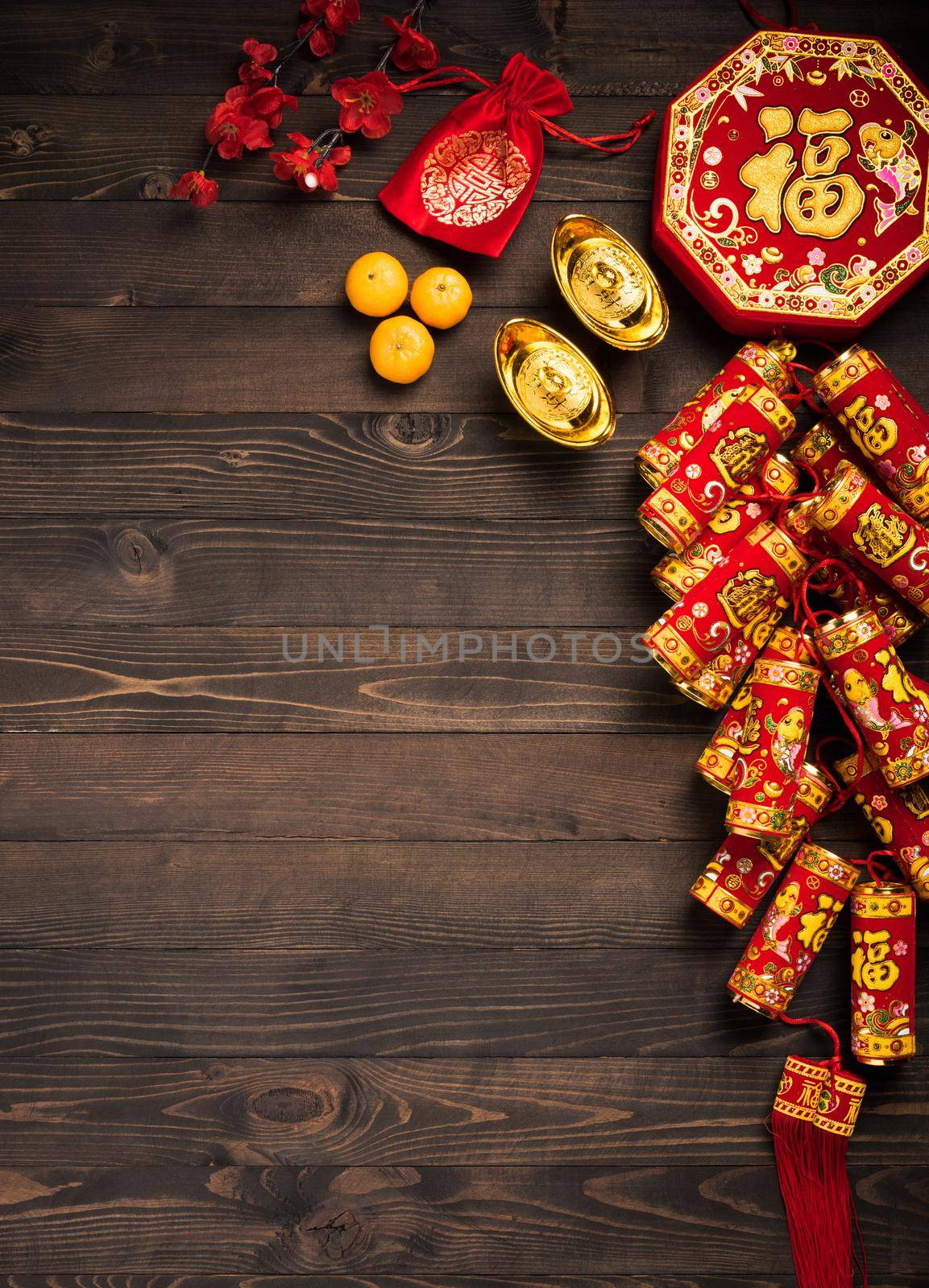 The Chinese new year festival, Top view flat lay happy Chinese new year or lunar new year decorations celebration with copy space on wood background (Chinese character "fu" meaning fortune good luck)