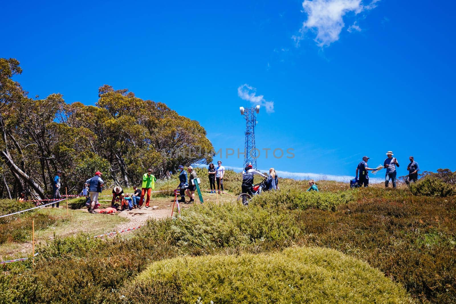 MT BULLER, AUSTRALIA - JANUARY 16, 2021: Liam Eaton is attended to after a crash during the finals for the Victorian Downhill Mountain Bike Series at Mt Buller