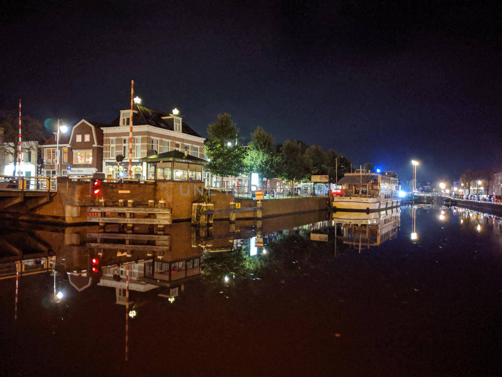 Canal at night in Sneek by traveltelly