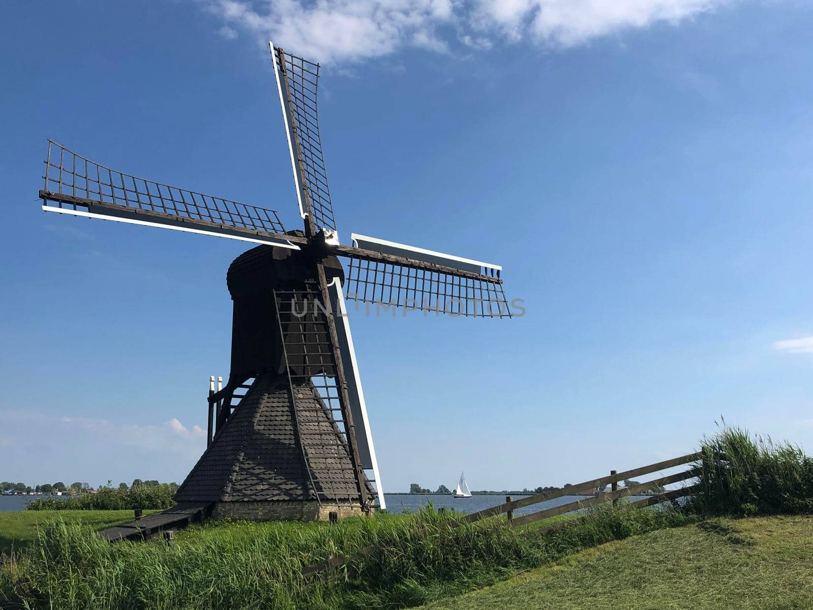 Windmill doris mooltsje near the village of Oudega, Friesland, Netherlands.