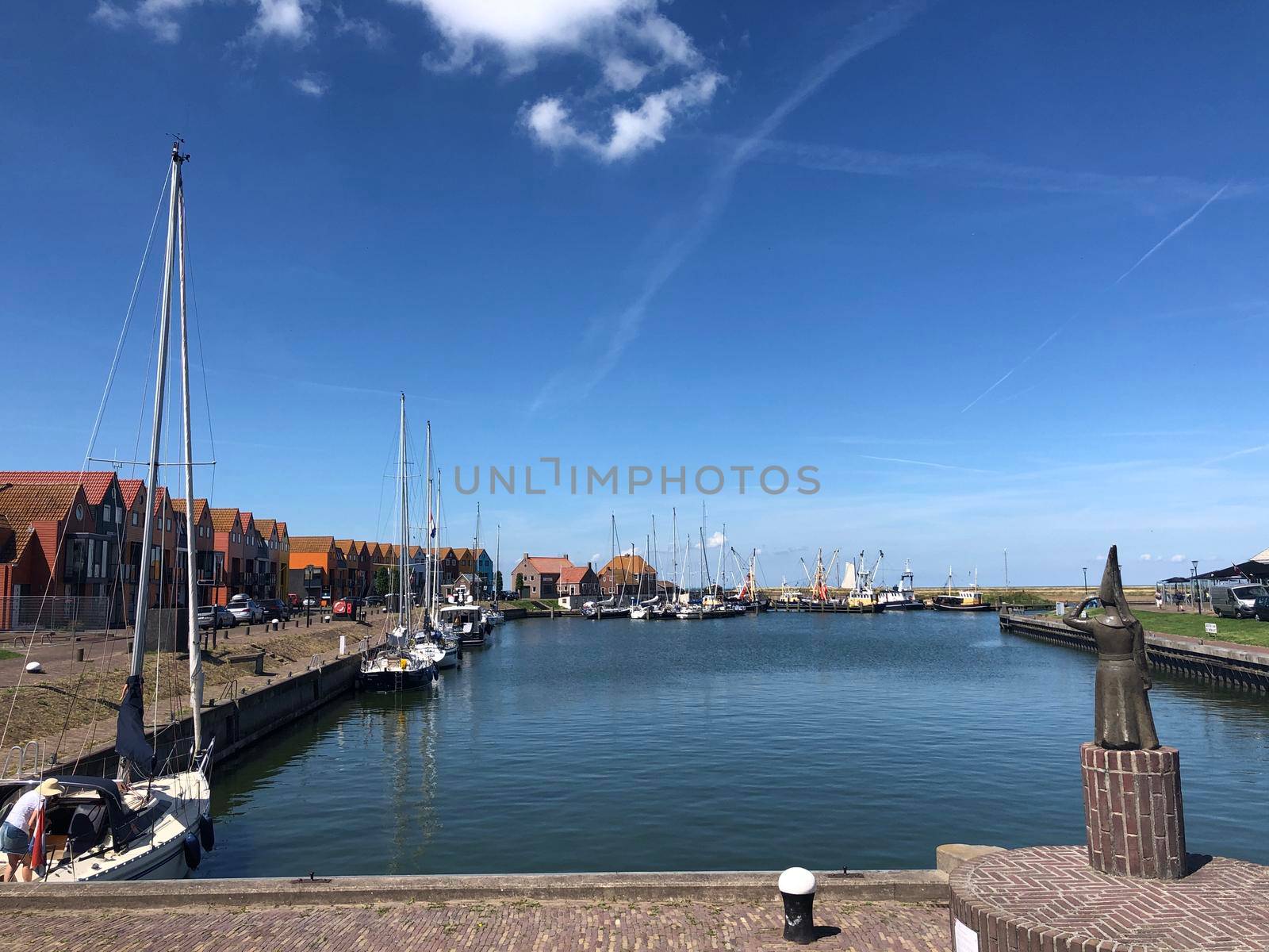 Harbor of Stavoren in Friesland by traveltelly