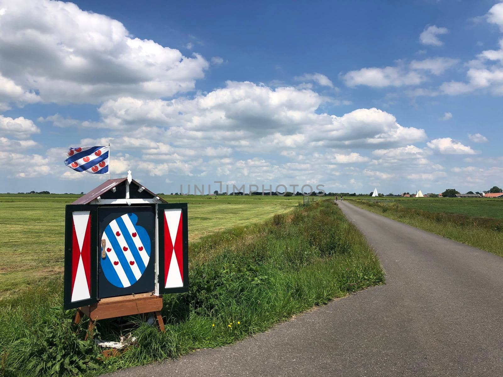 Frisian box and flag around It Heidenskip in Friesland, The Netherlands