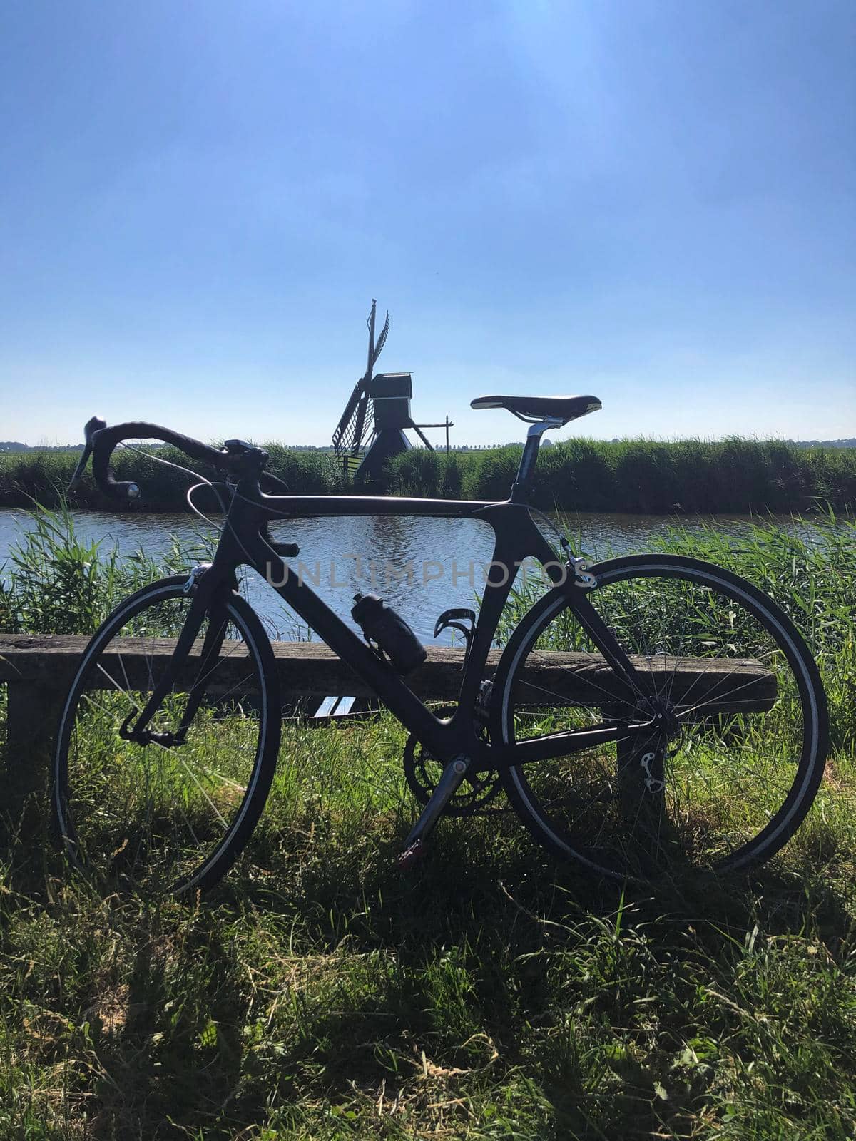 Race bicycle with a windmill in The Netherlands