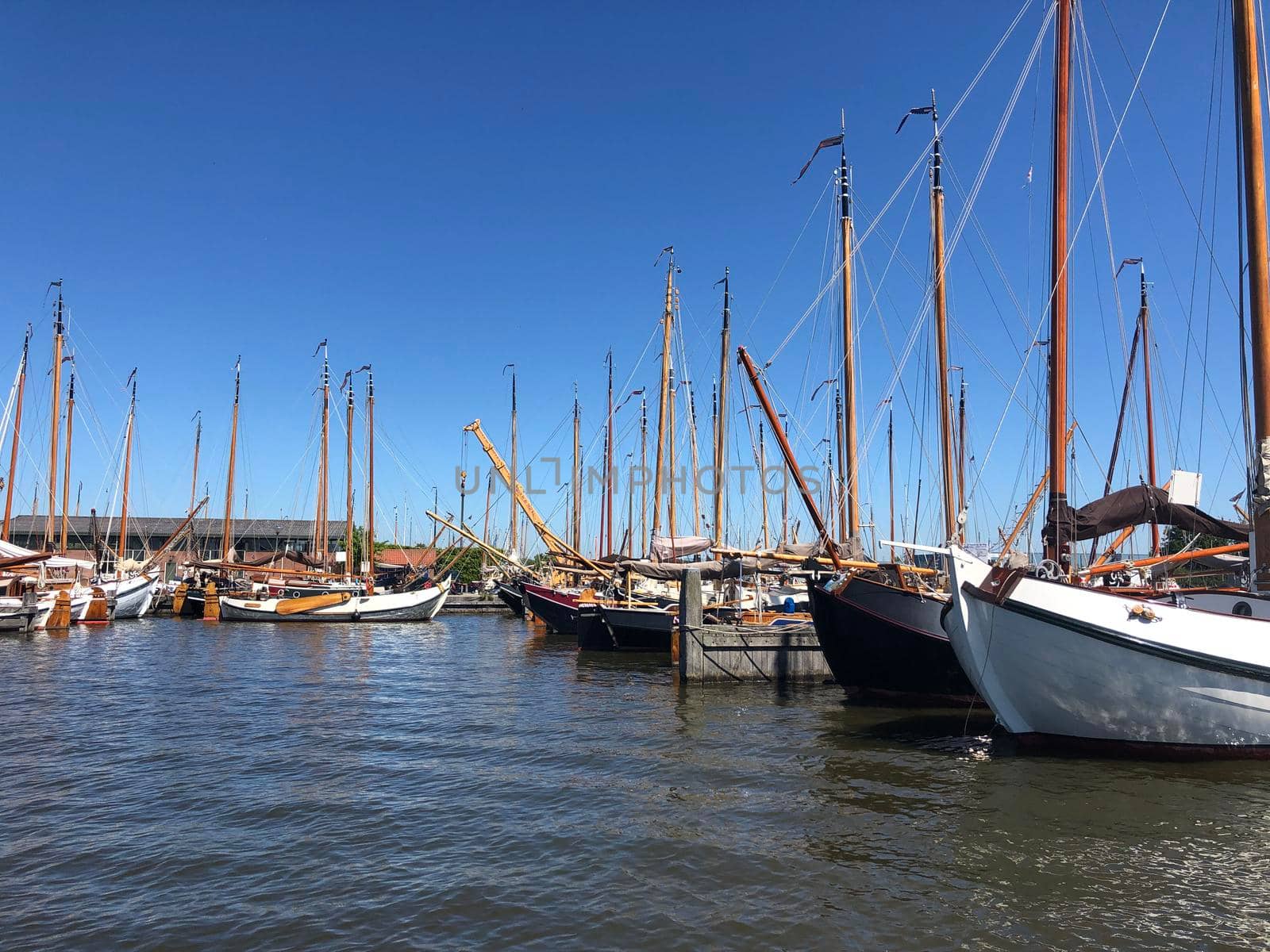 Wooden sailboats in Heeg by traveltelly