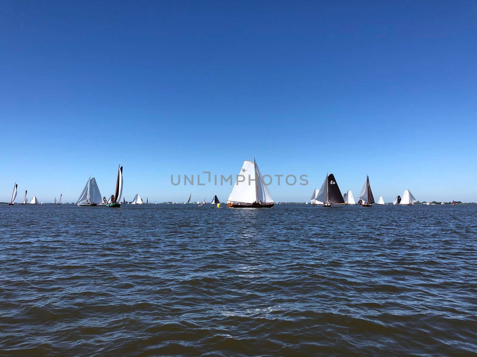 Sailing on a lake in Friesland The Netherlands