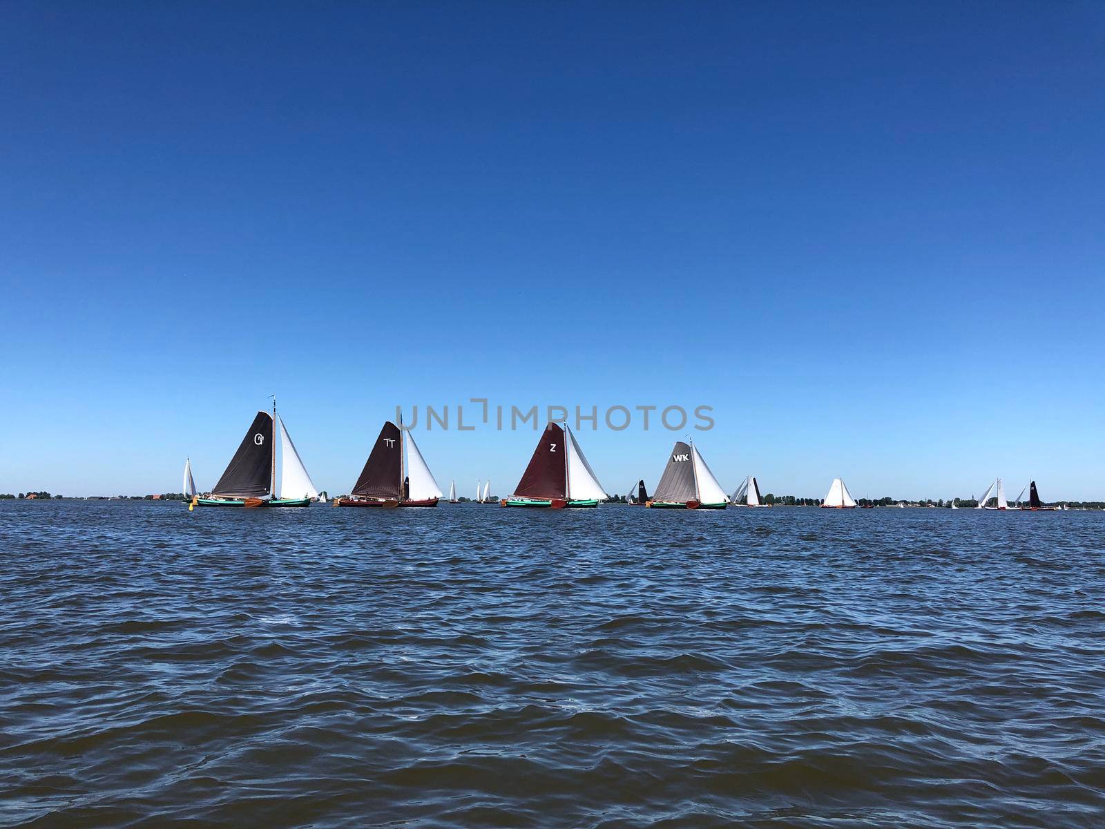 Sailing on a lake in Friesland The Netherlands